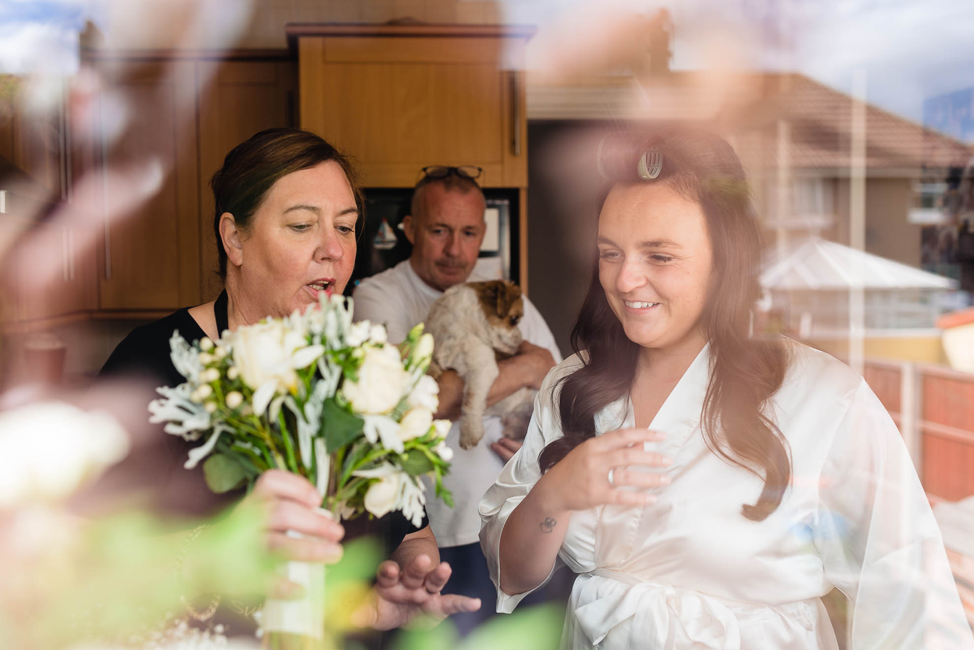 Bride receives the wedding flowers