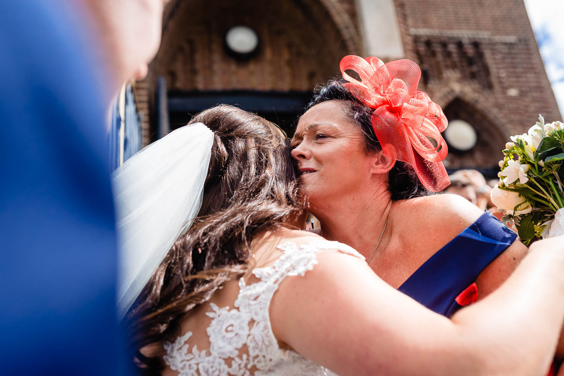 Guest gives bride a hug