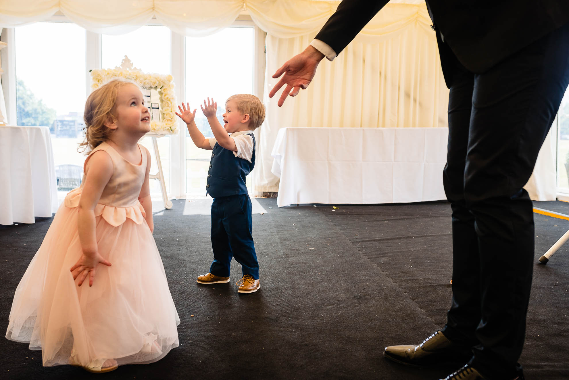 Little girl and boy dancing