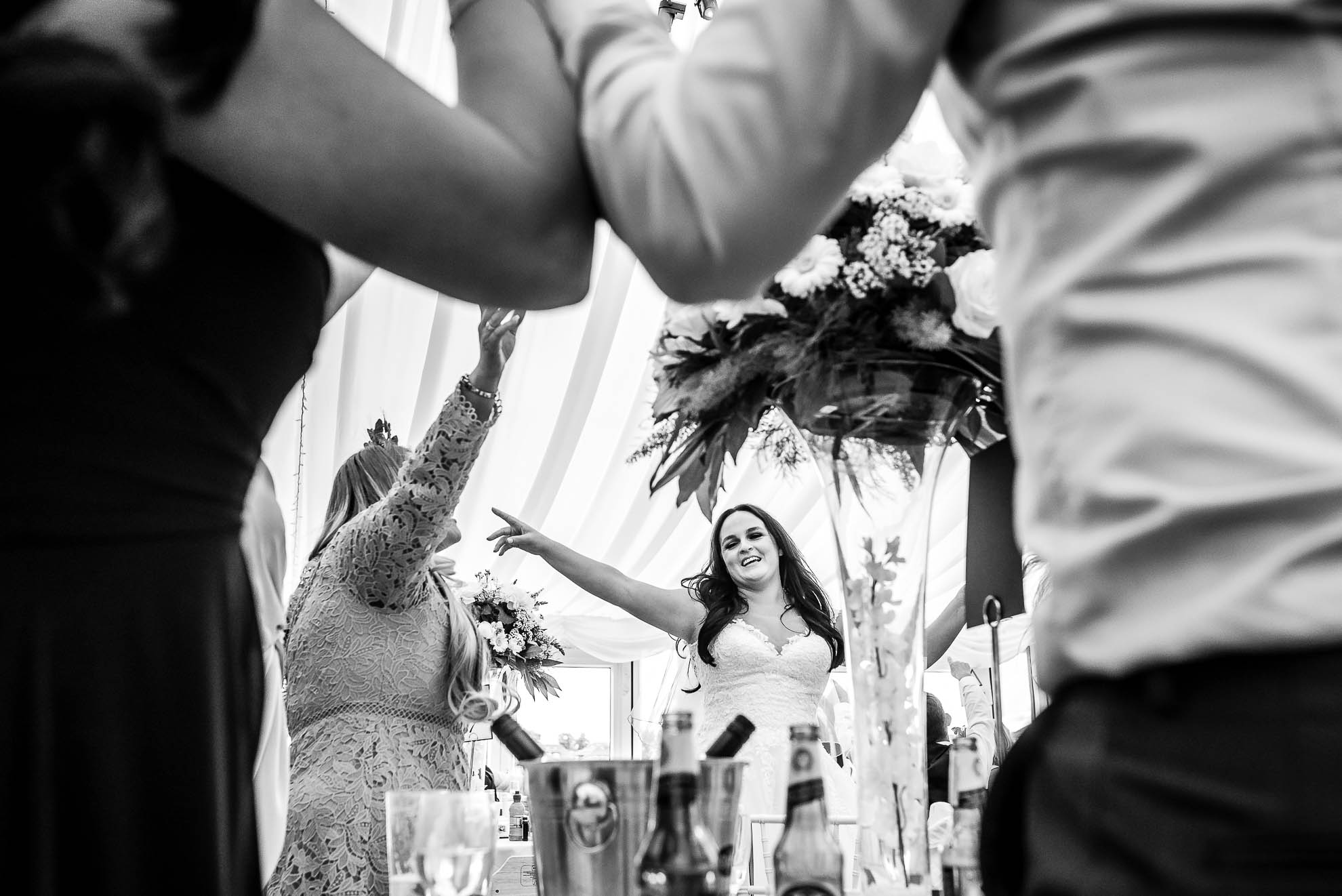 Bride dancing with guests