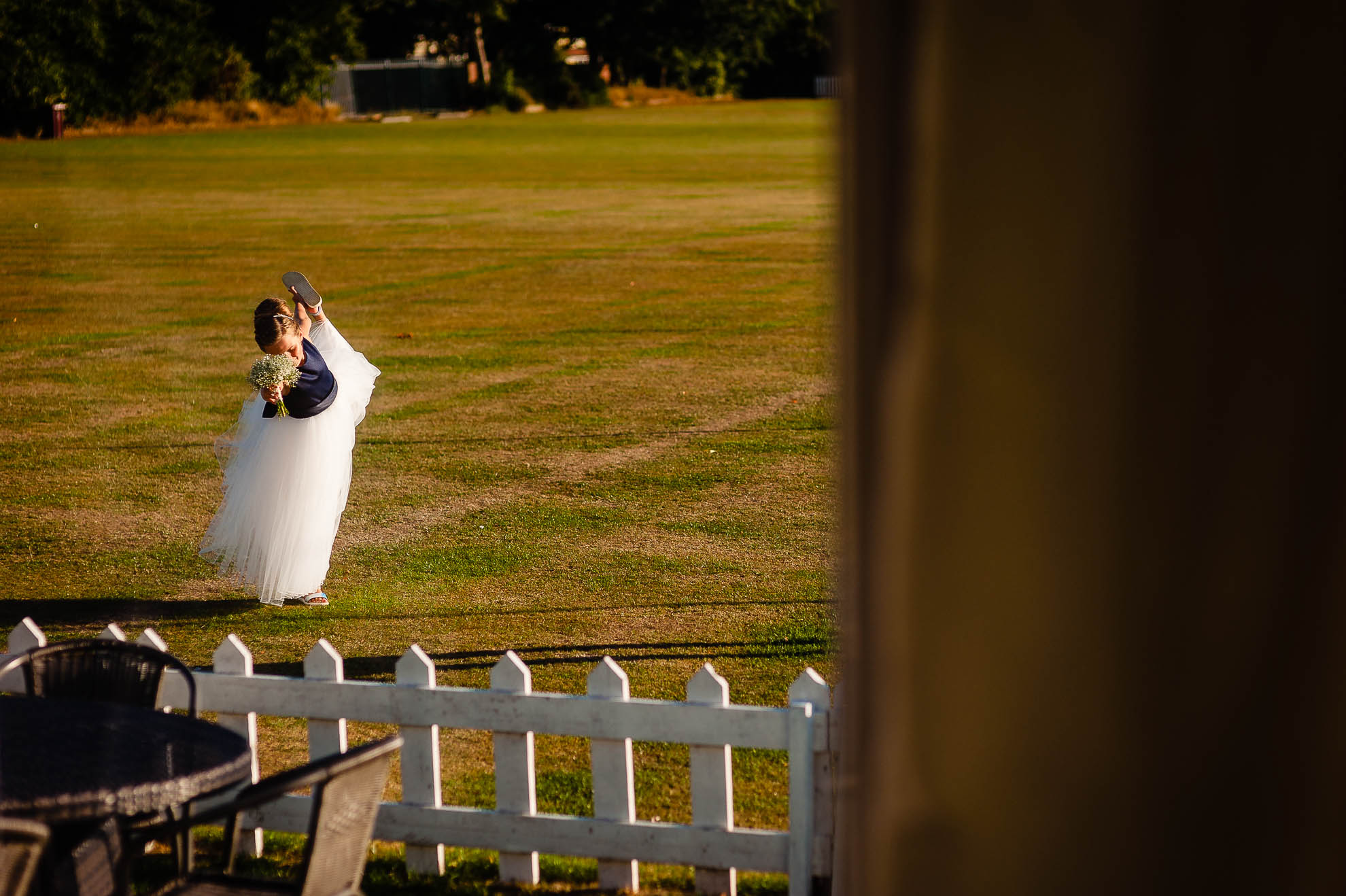 Bridesmaid playing with her flowers