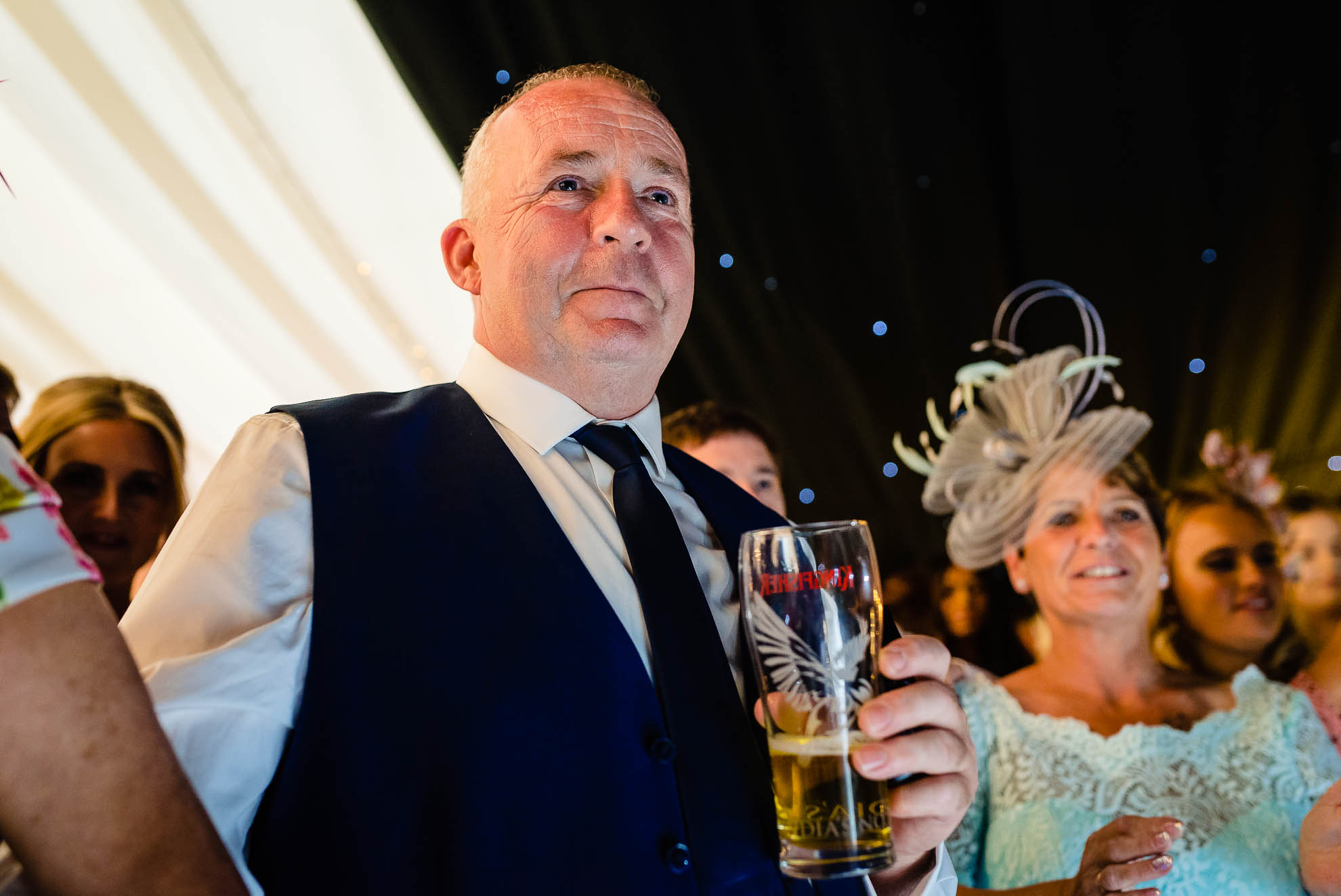 Father of the bride watches the first dance