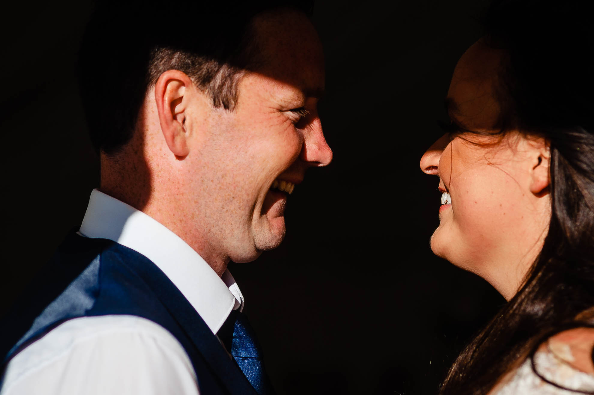 Newlyweds laugh together 