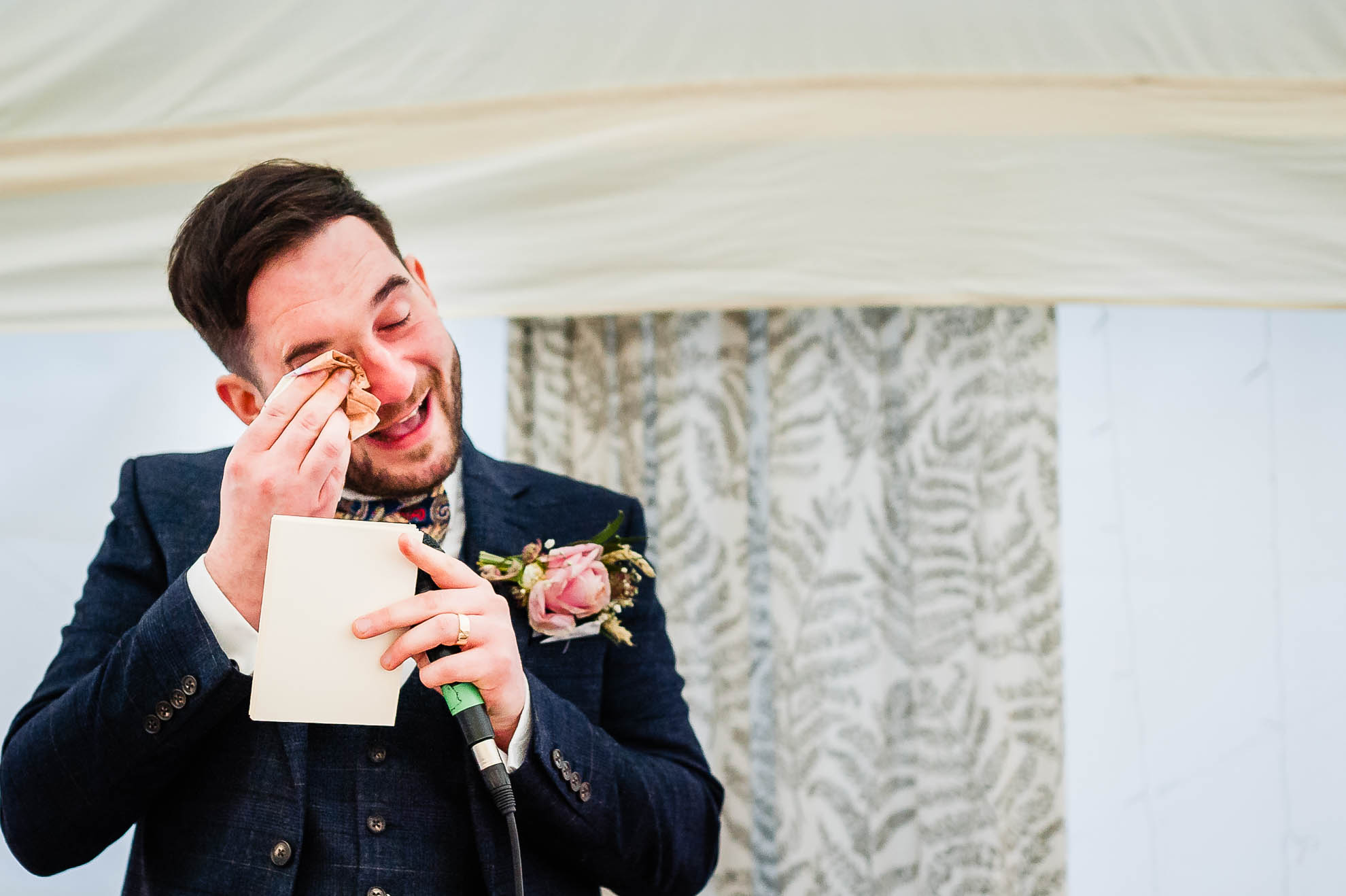 Groom sheds a tear as he gives his speech