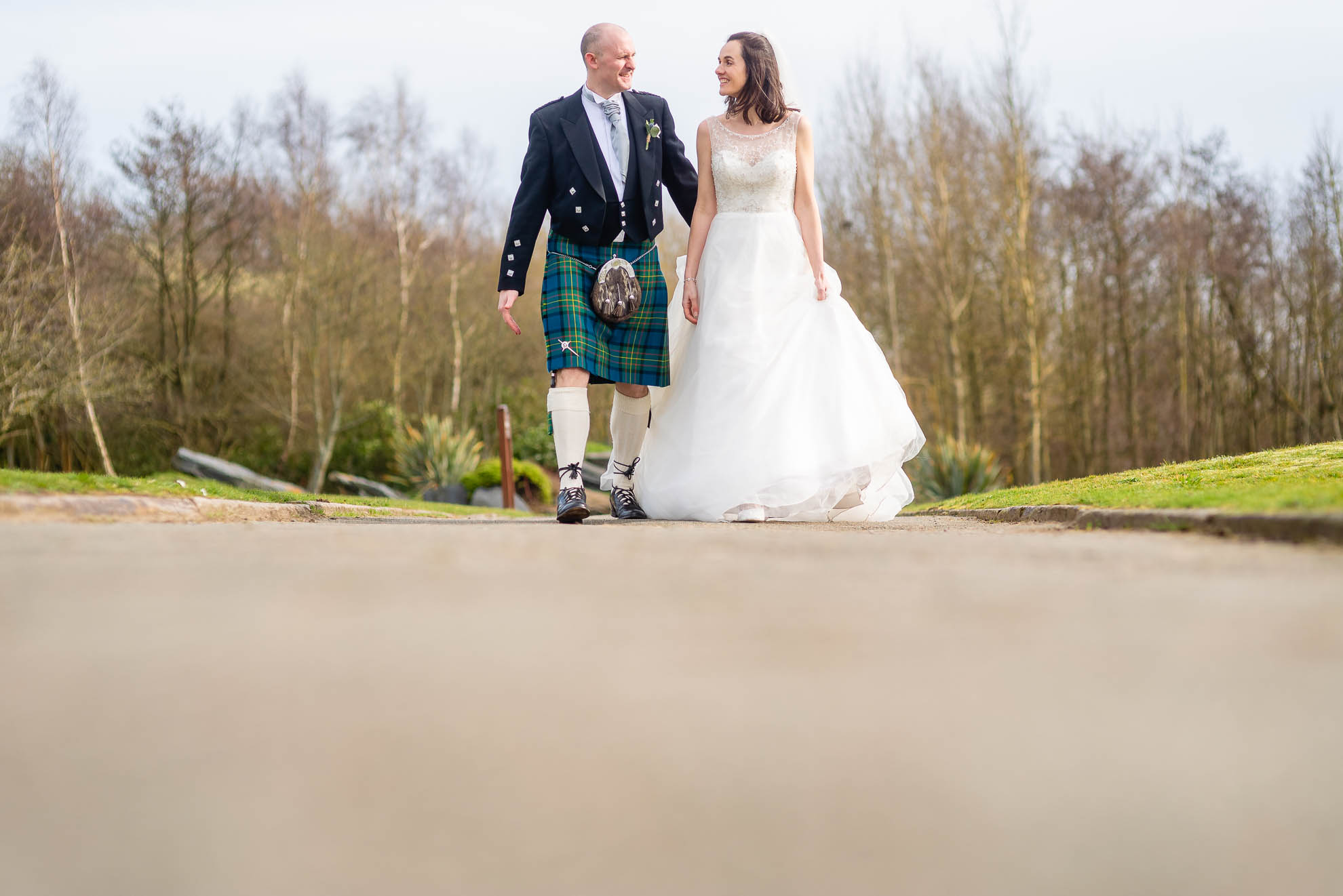Bride and groom walk together 