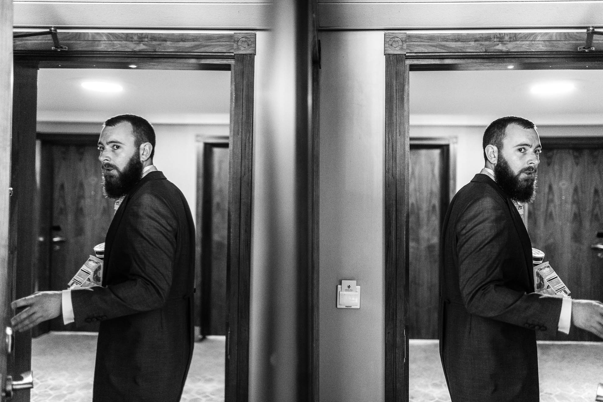 Best man reflection in mirror