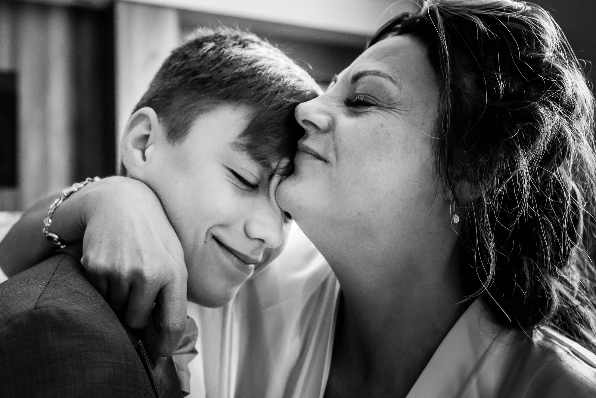 Bride hugs her son