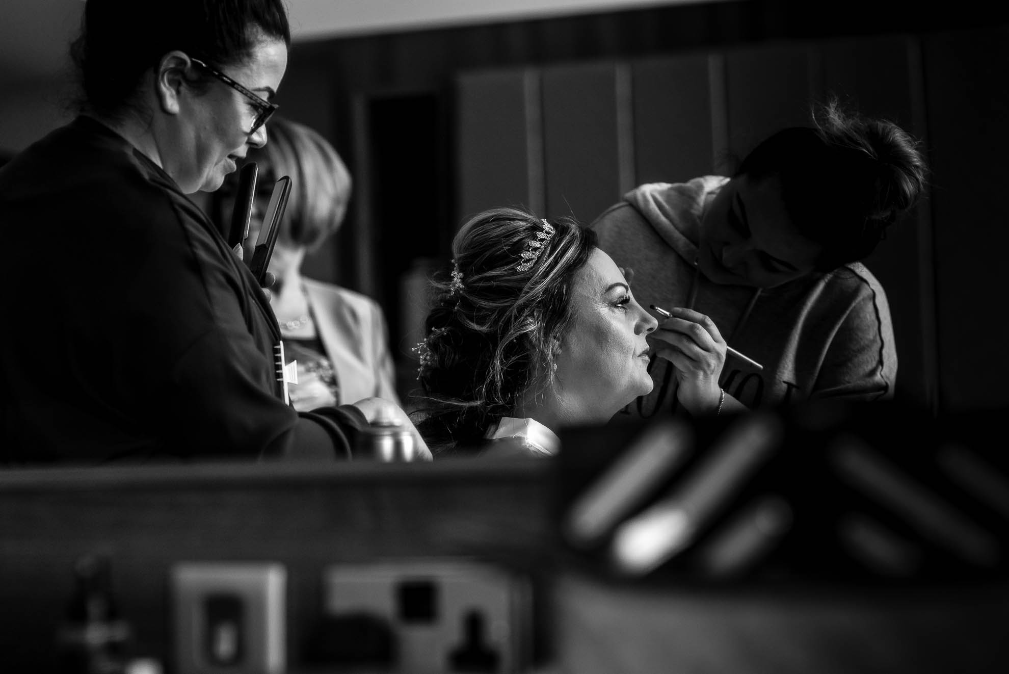 Bride has her make up applied