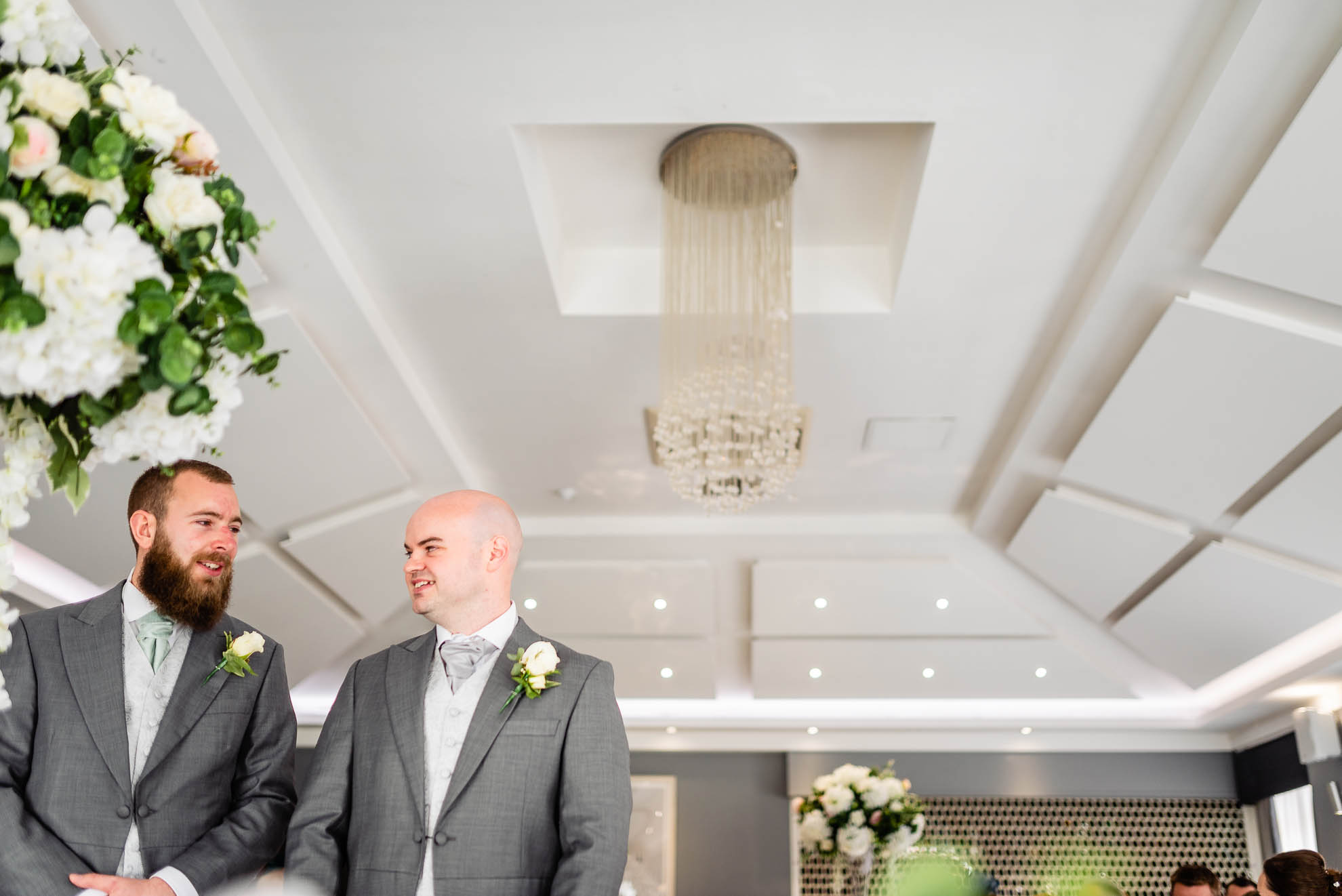 Groom waits for his bride with his best man
