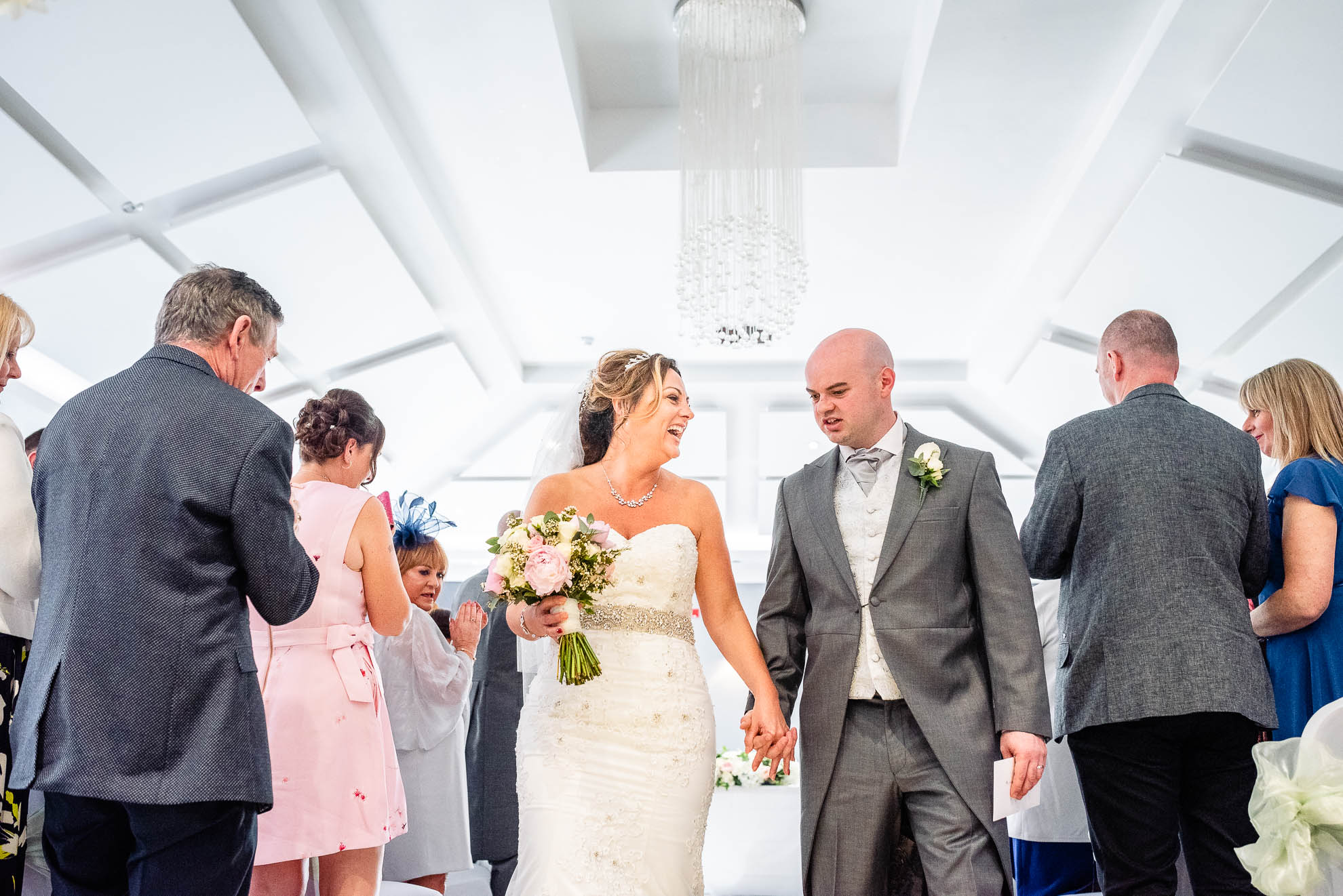 Newlyweds walk back down aisle