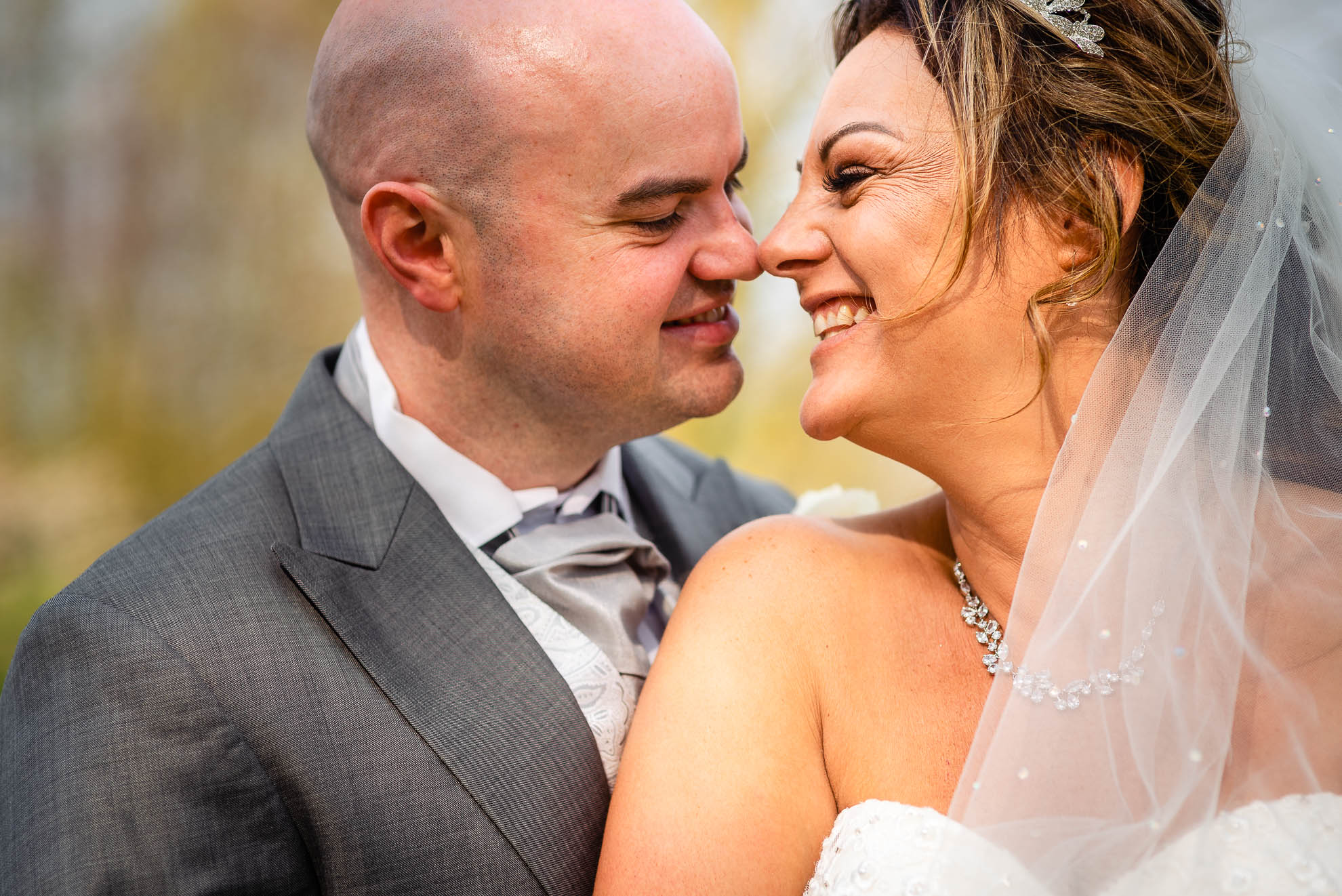 Bride and groom hold each other