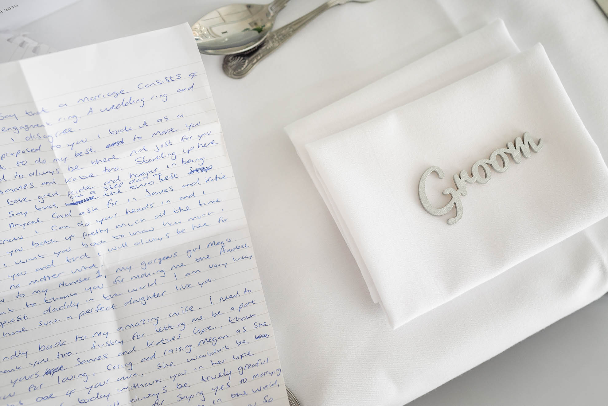 Grooms place setting with his speech notes 