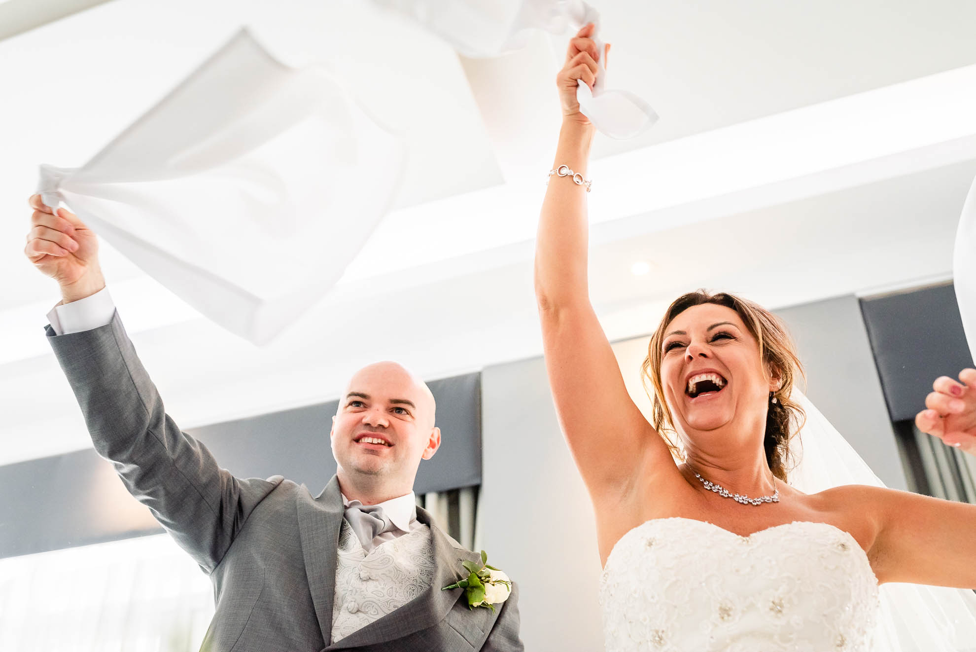Bride and groom swing napkins