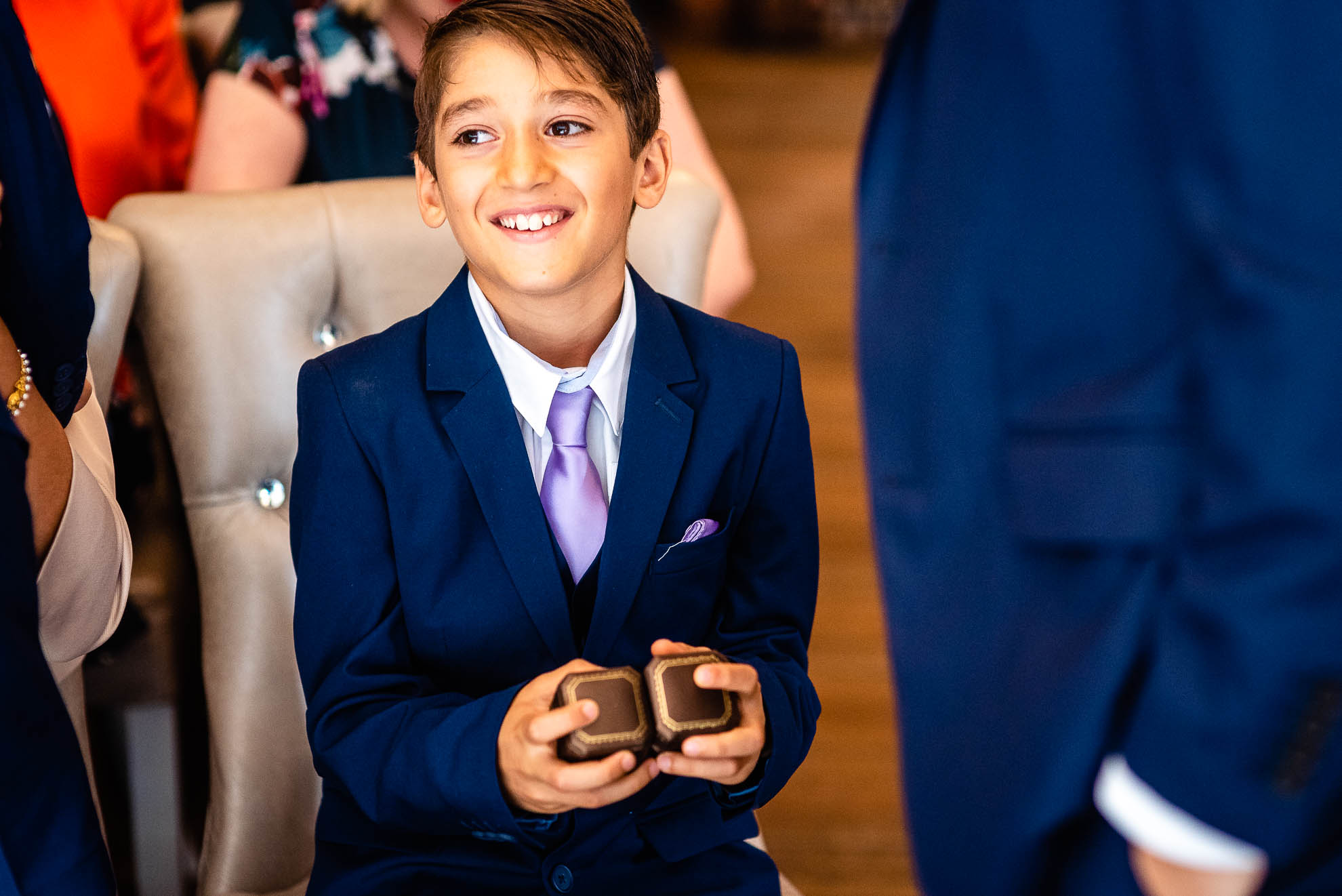 Bride and groom's son with wedding rings