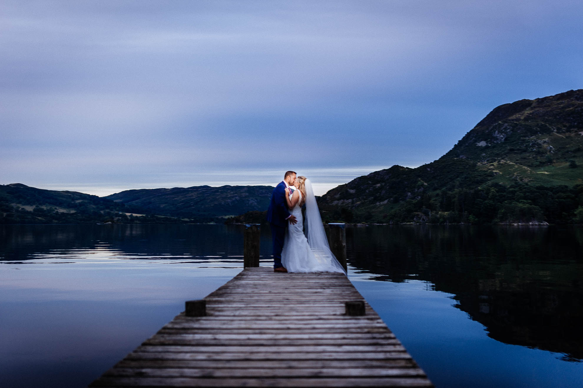bride and groom portrait on Lake Windermere