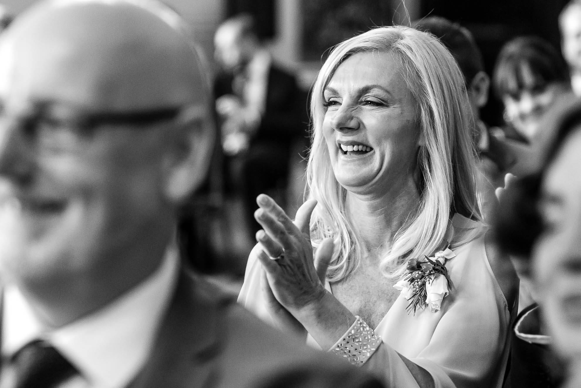 Mother of the bride congratulates the  newlyweds