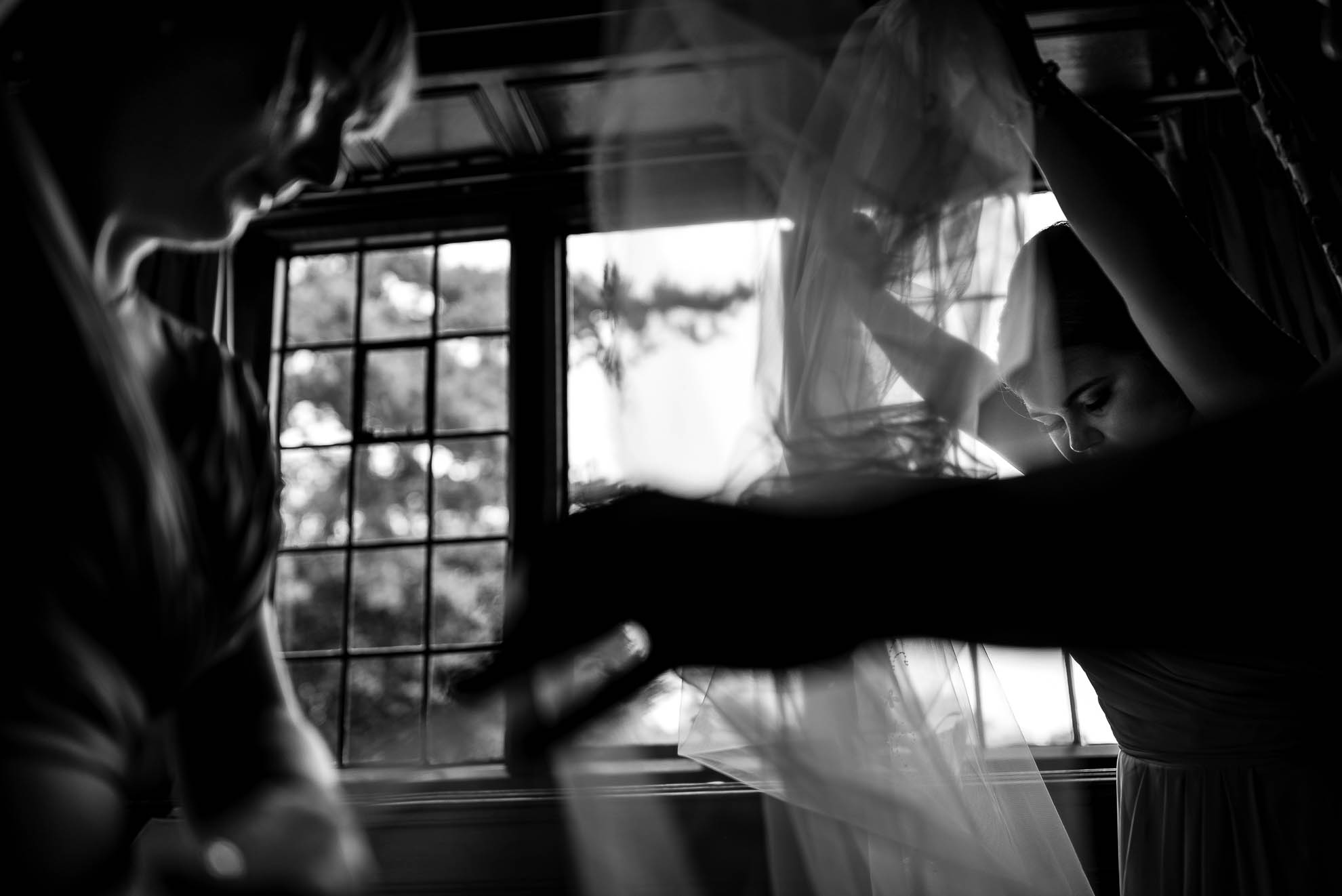 Bridesmaids even out veil