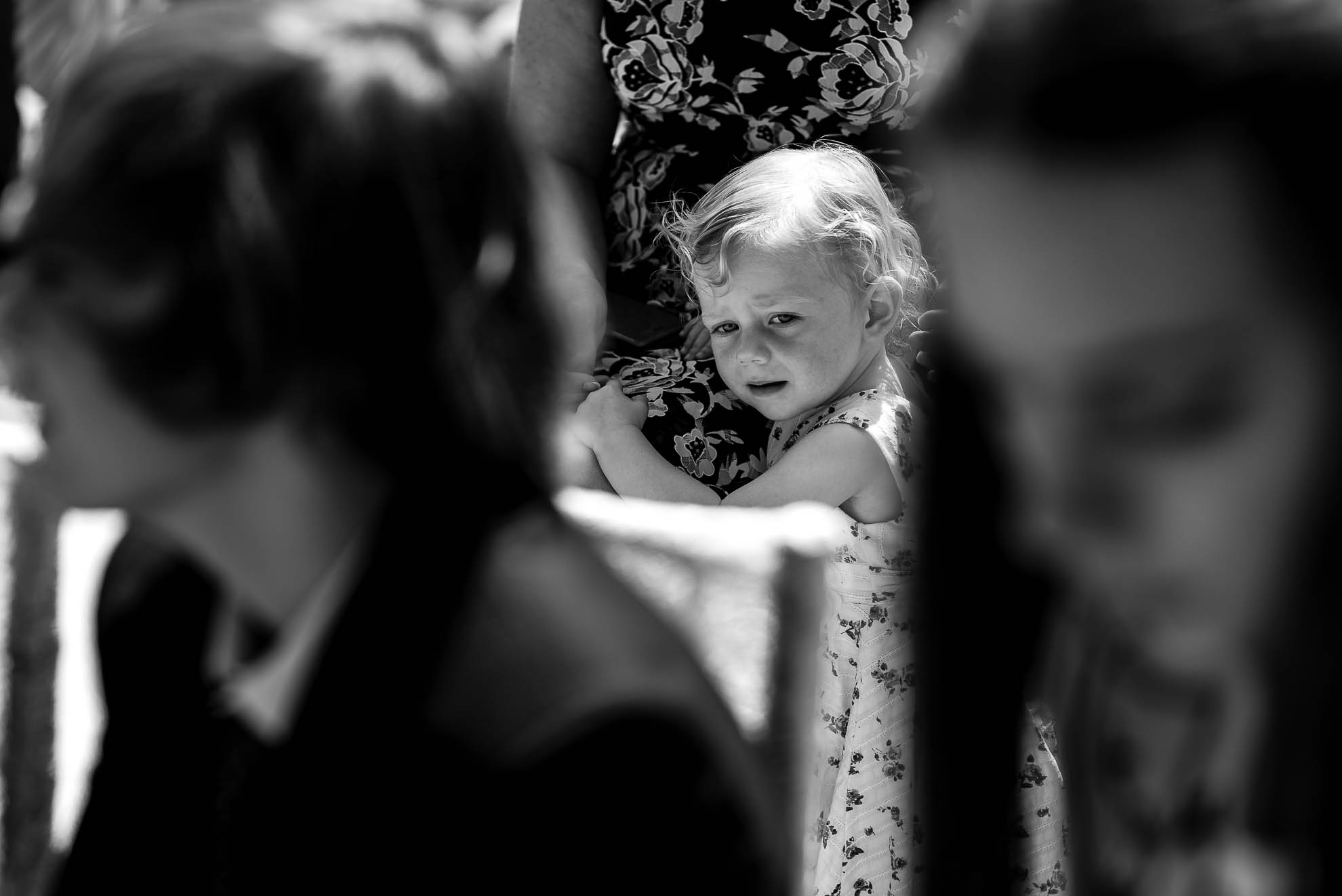 Little girl hugs her mum