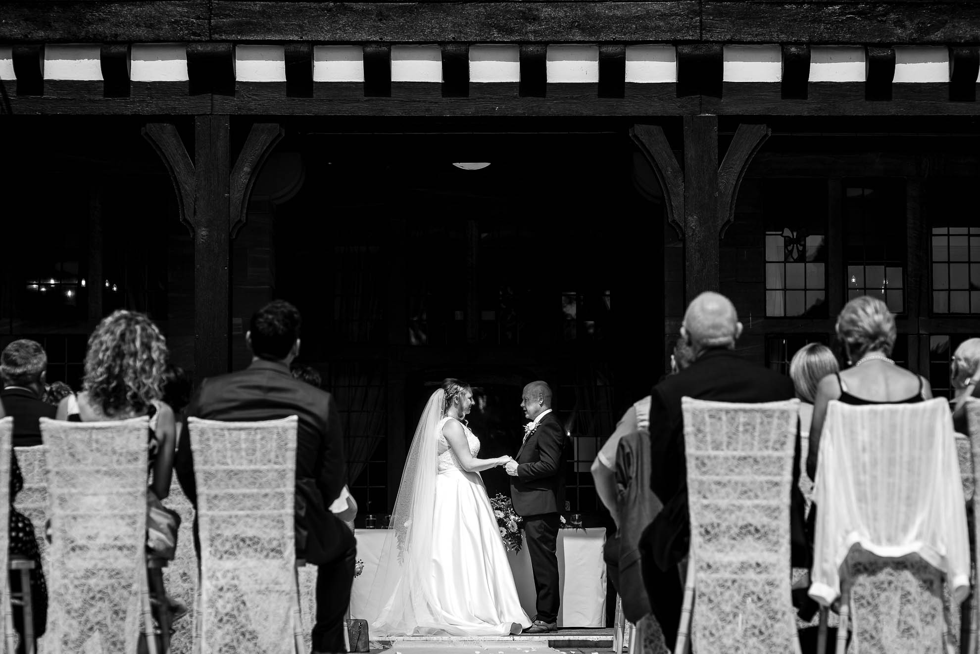 Bride and groom exchange rings