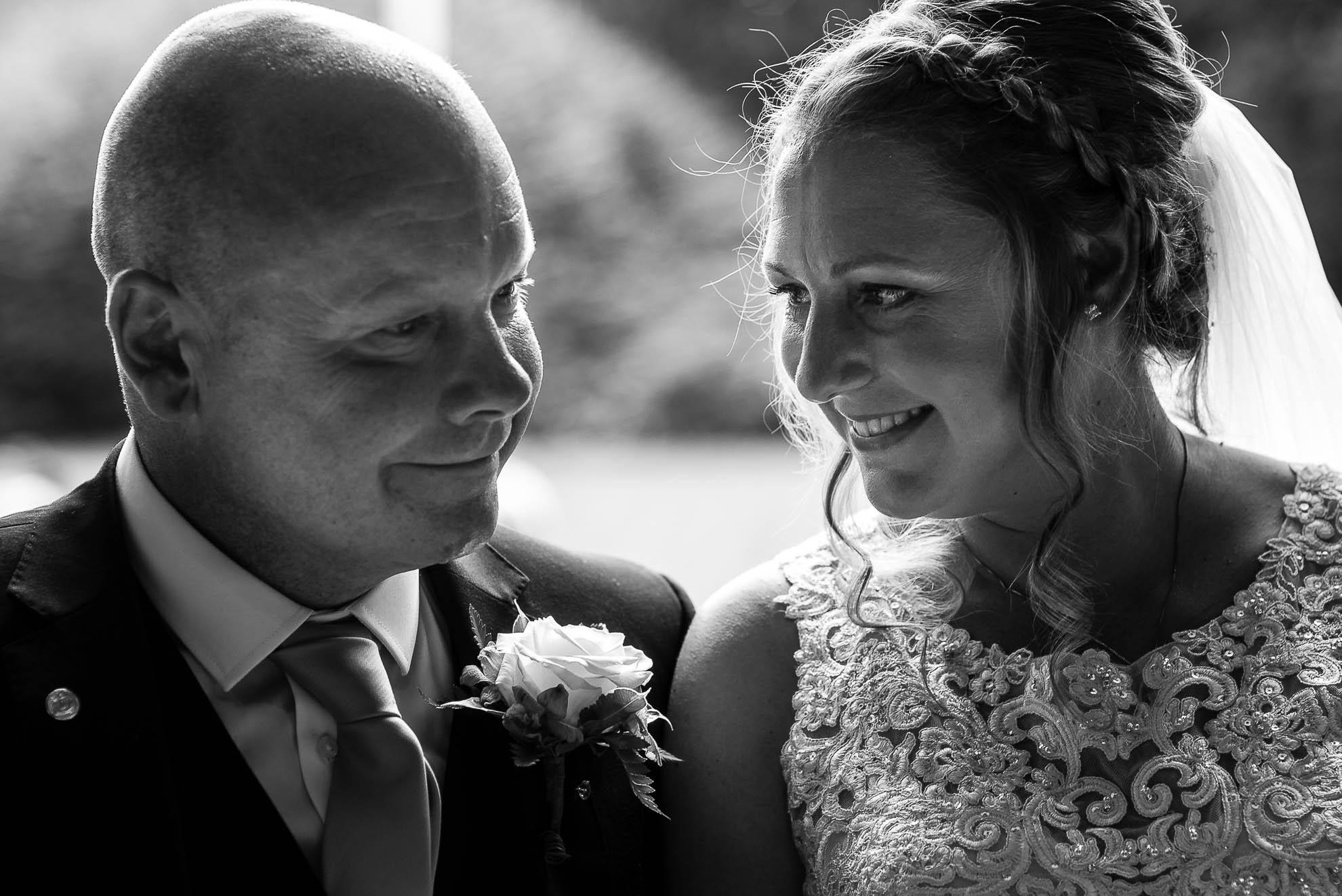 Bride looks at the groom