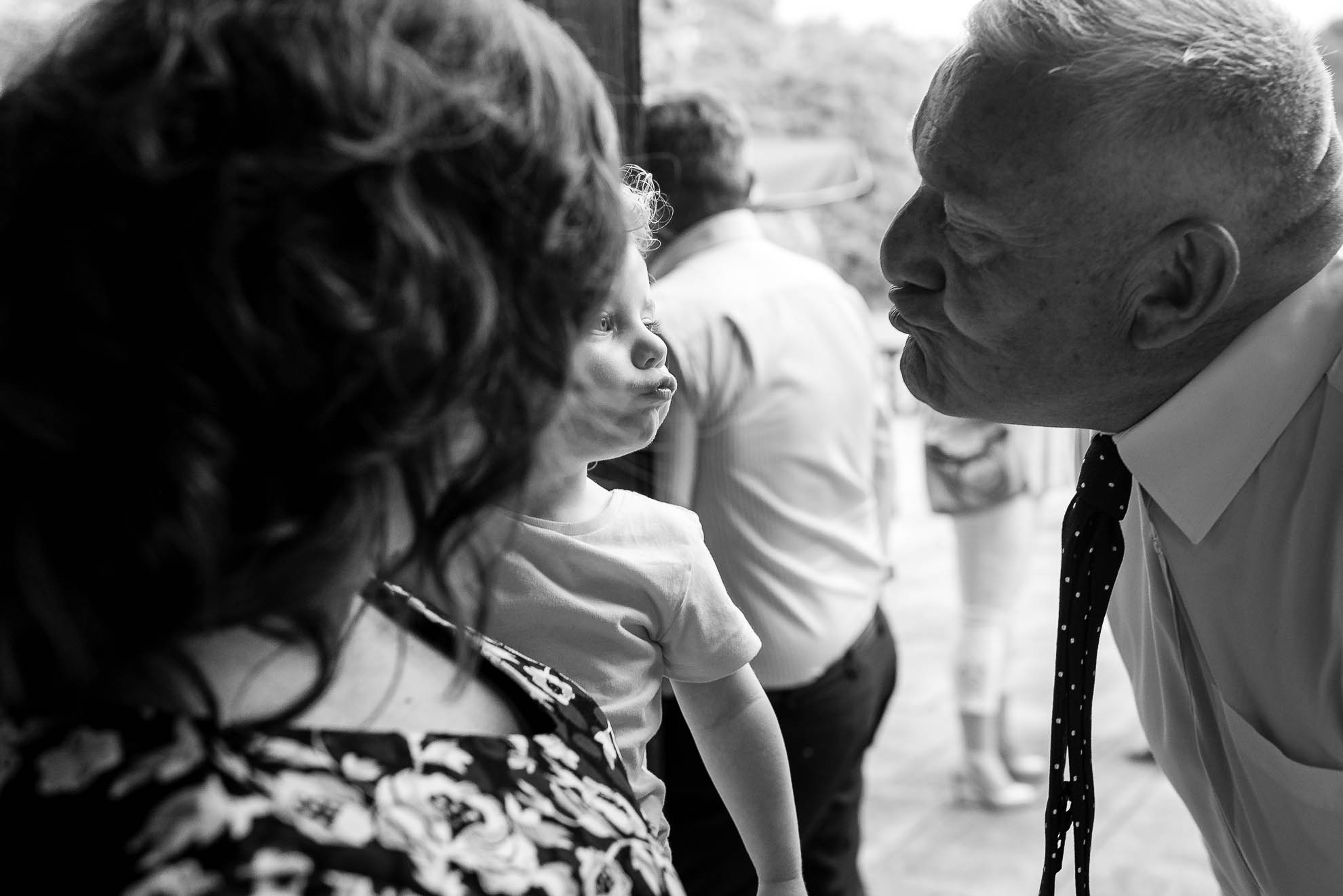 Guest kissing little girl