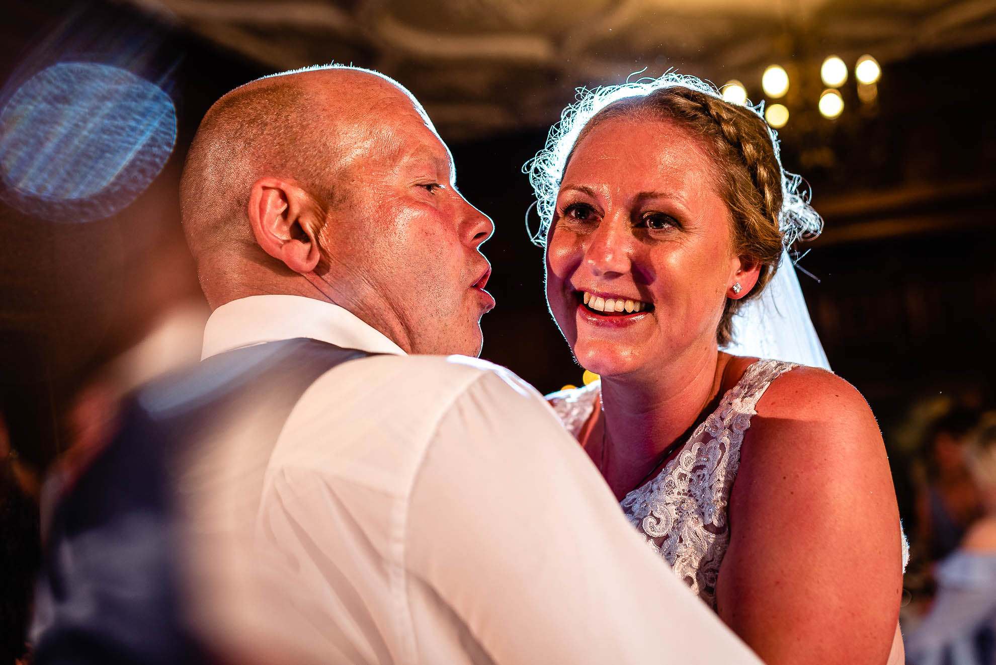 Close up of bride and groom during first dance
