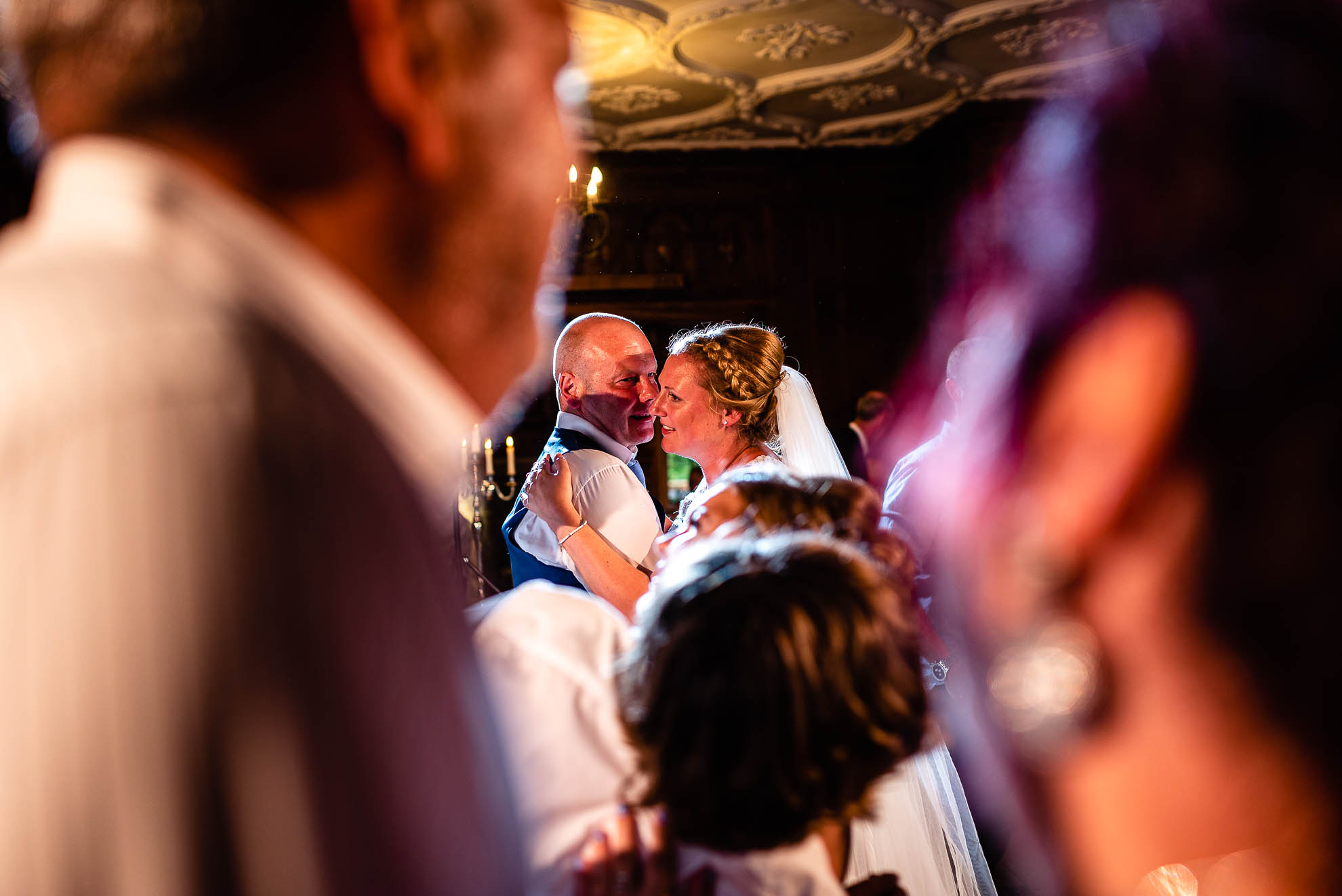 Bride and groom dancing with wedding guests