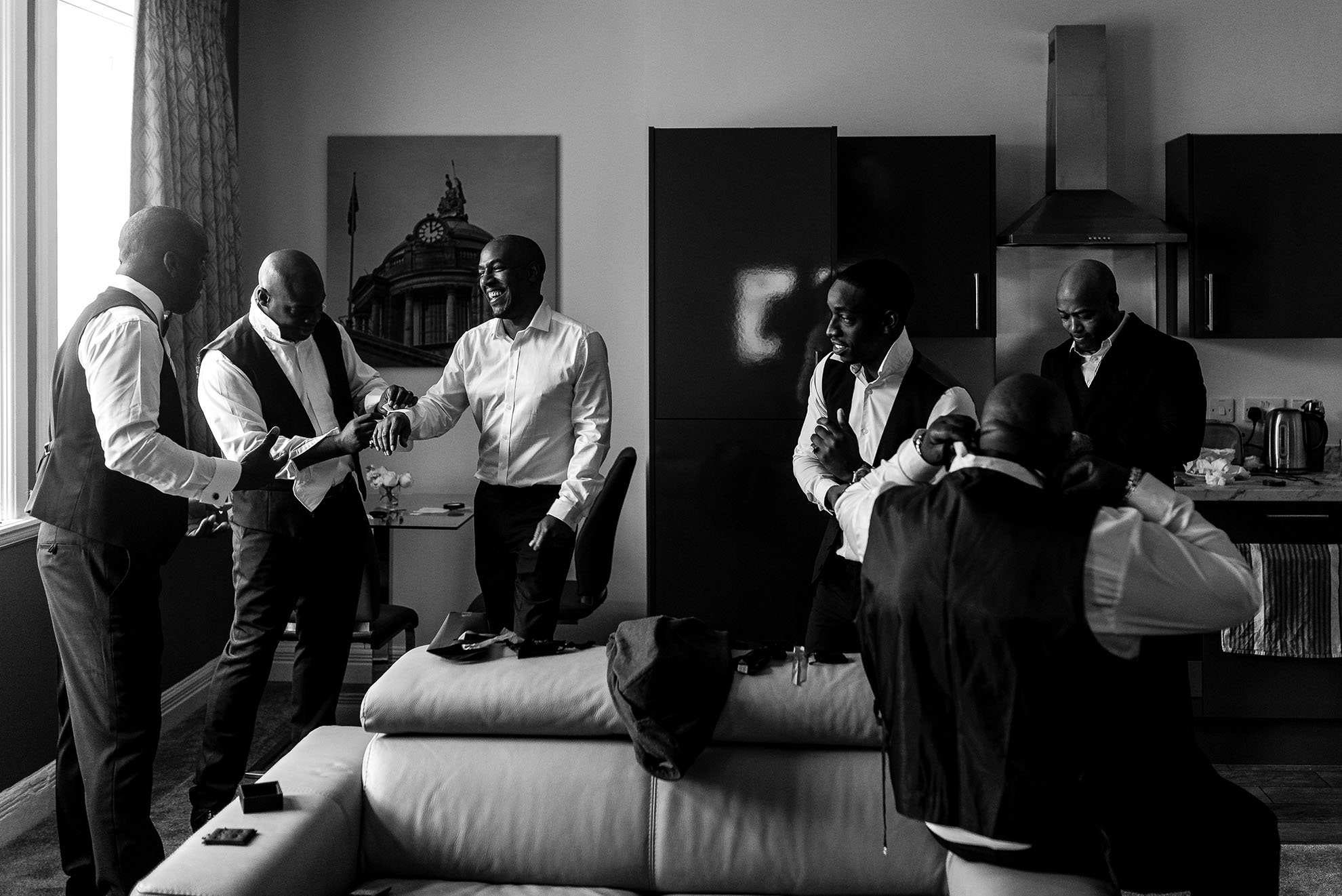 the groom and his groomsmen get ready