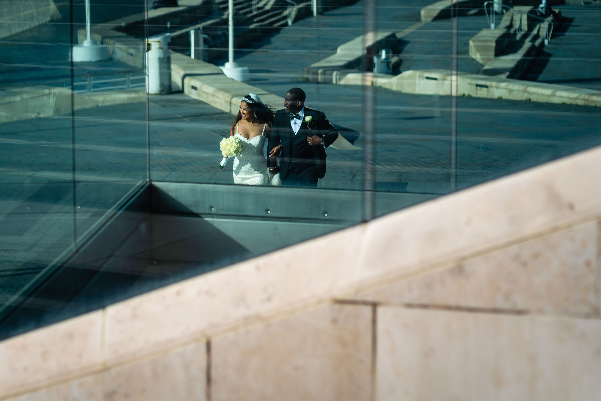 Happy couple walking by Liverpool Museum