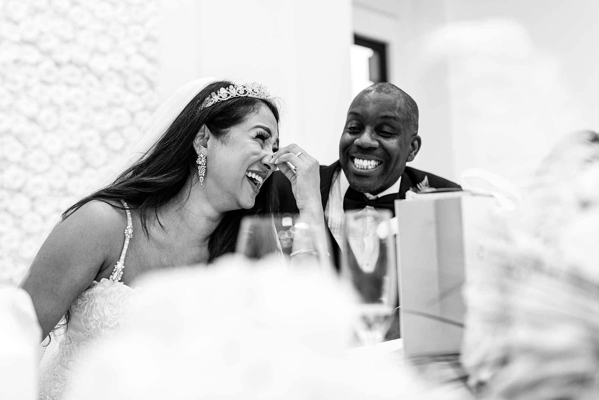 Bride laughs at Chief bridesmaids joke