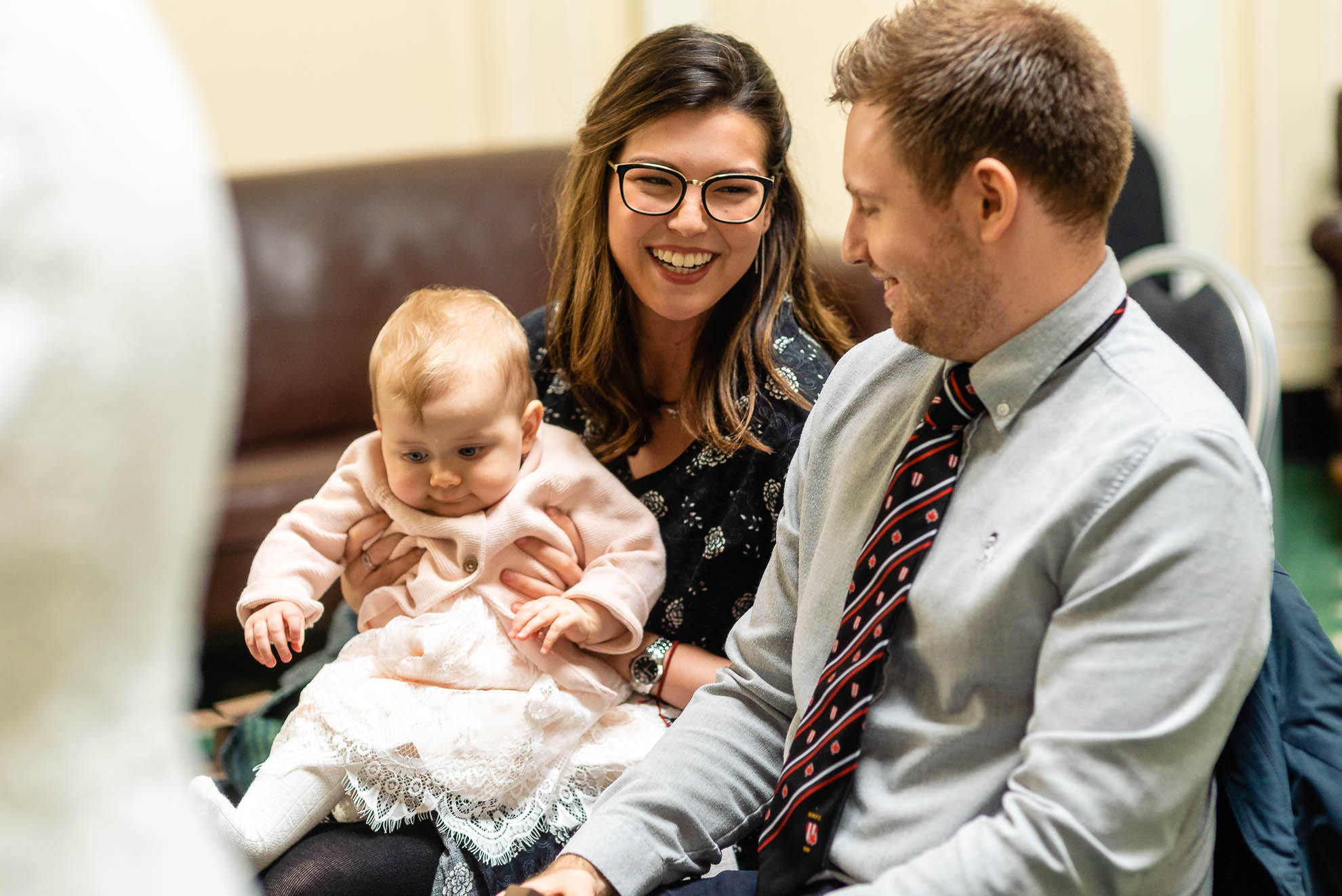 wedding guests share a joke