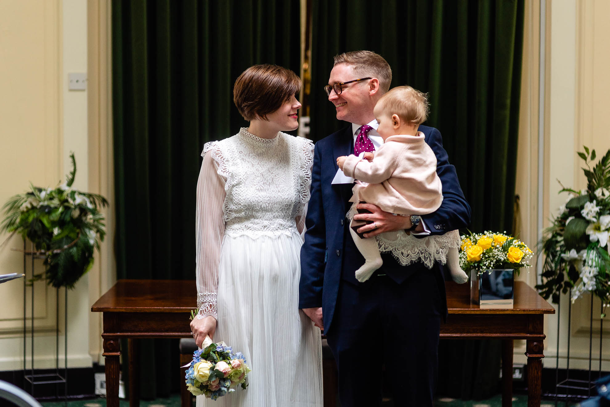 Bride and groom smiling 