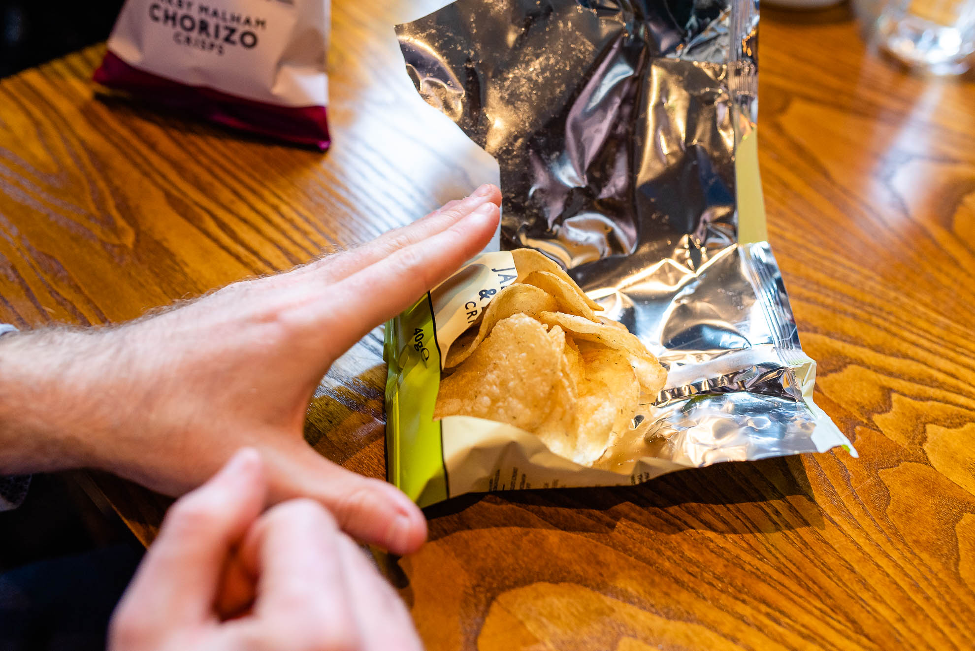 wedding guest eating crisp