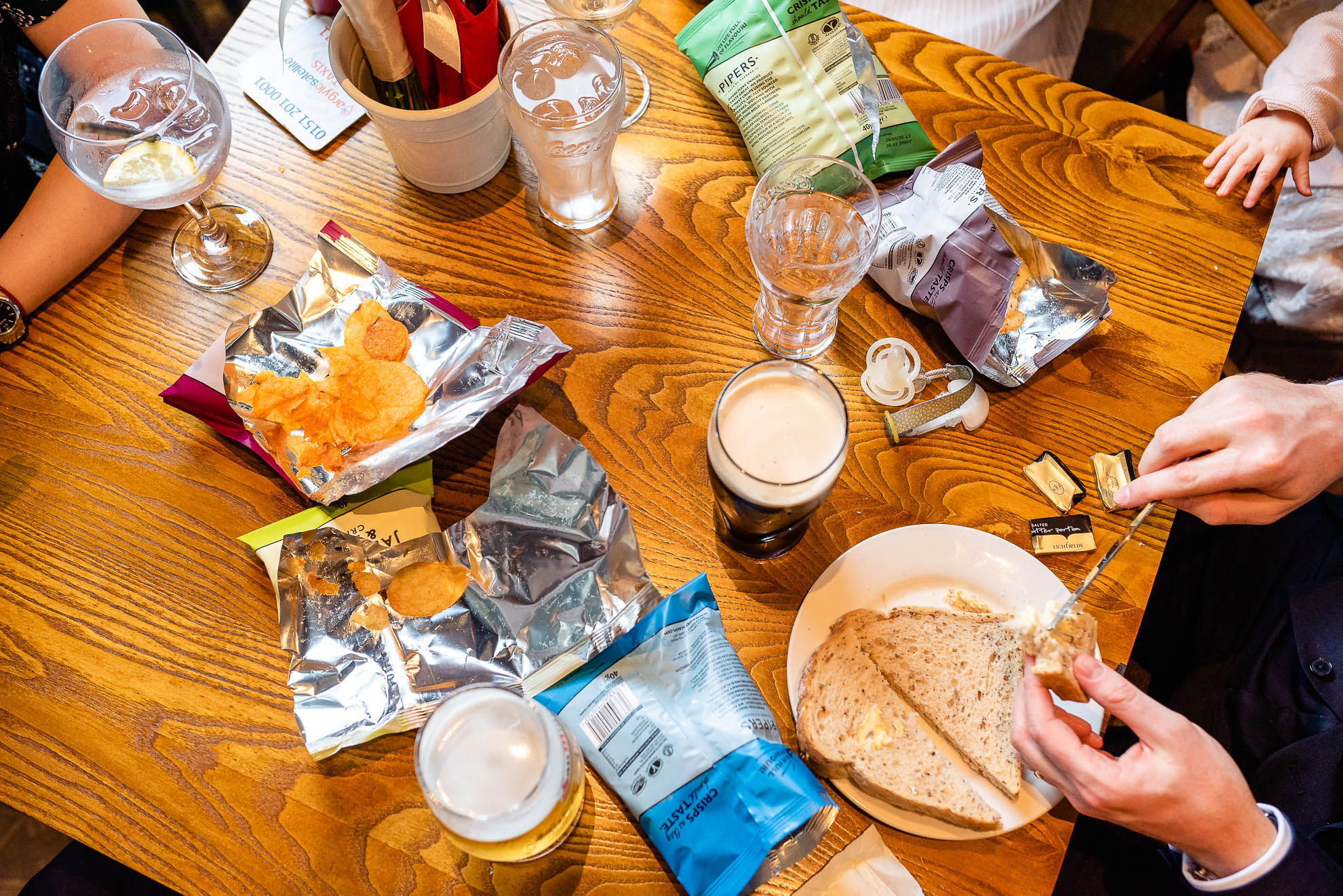table with beers and crisps