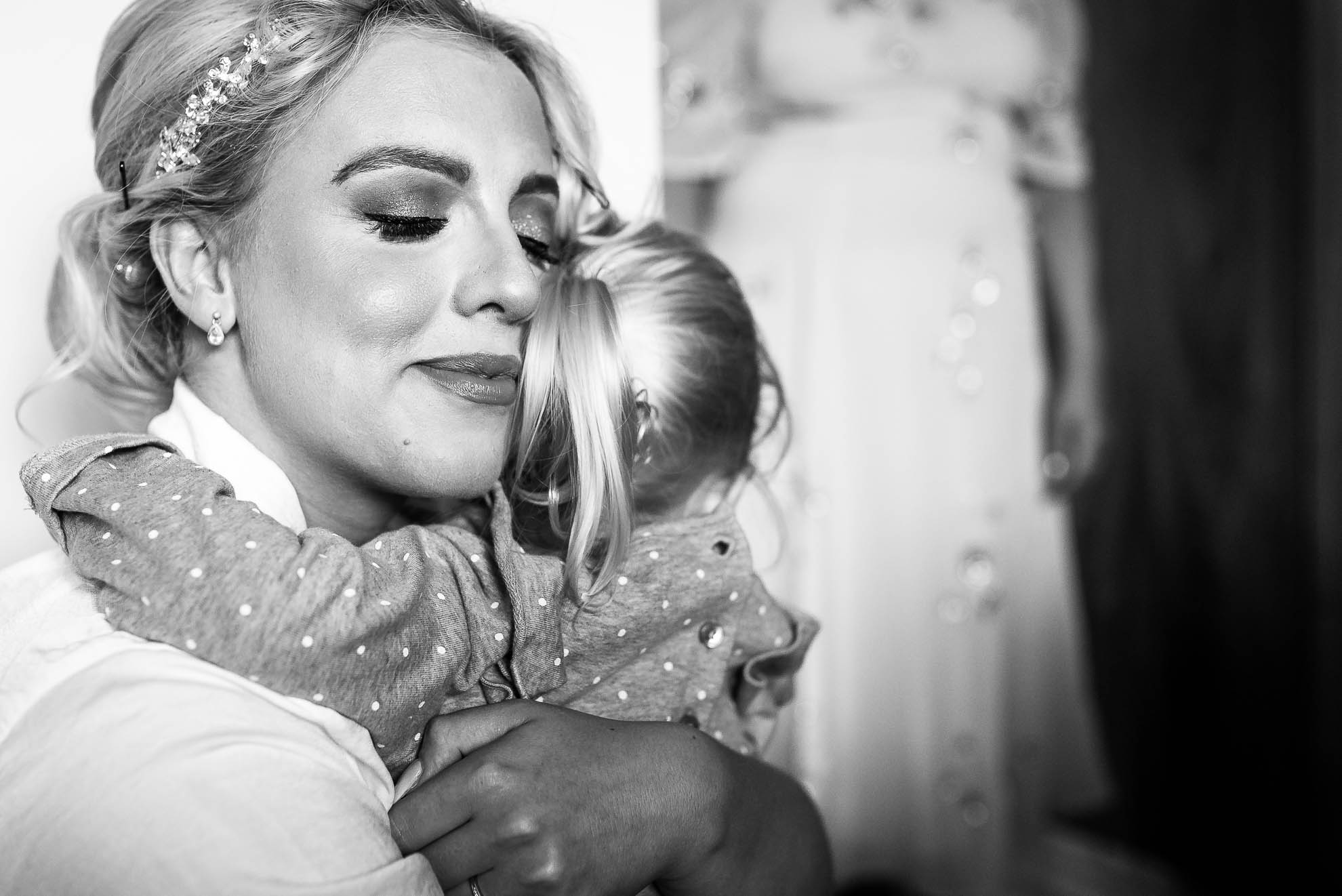 Bride hugs neice