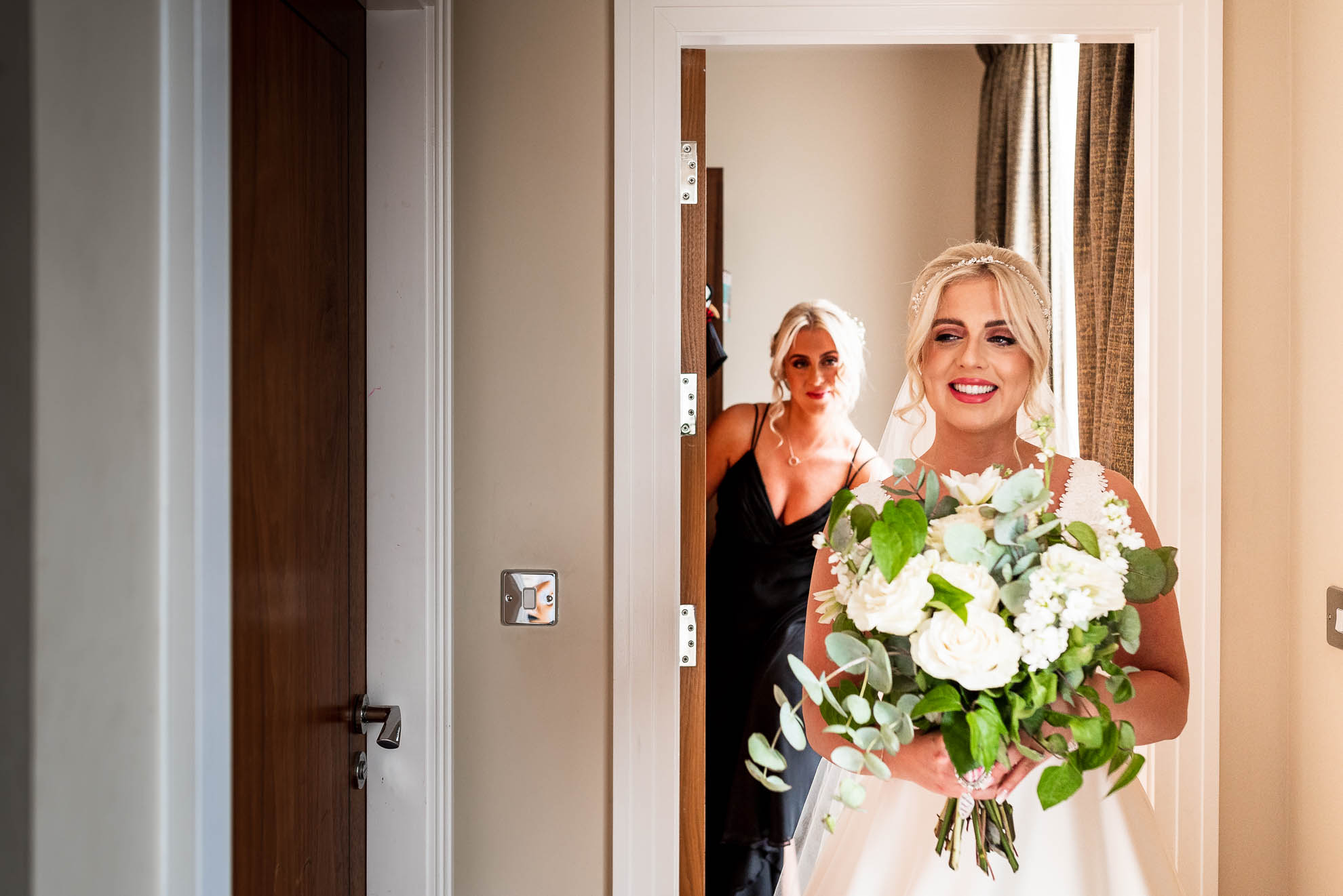 Bride shows off her dress 