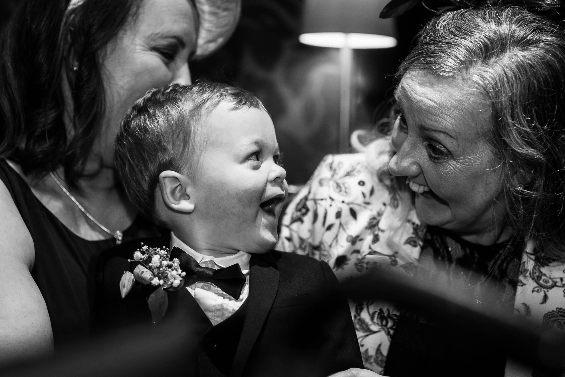 page boy shares a joke with guest
