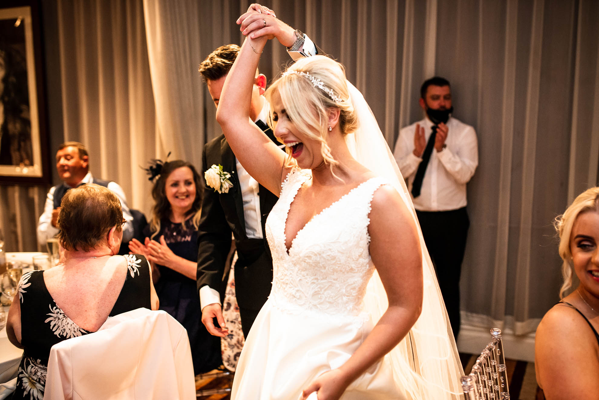 Bride and groom are announced into the wedding breakfast