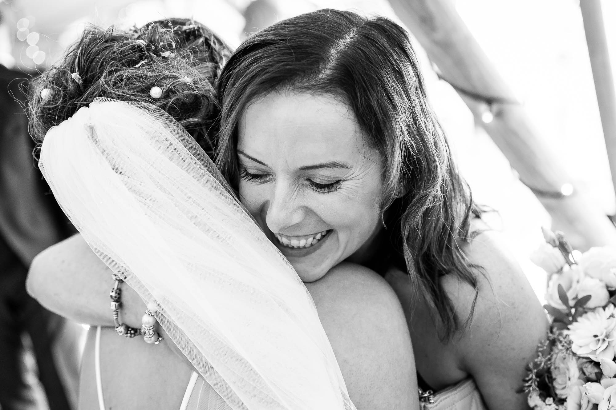 bride hugs guest