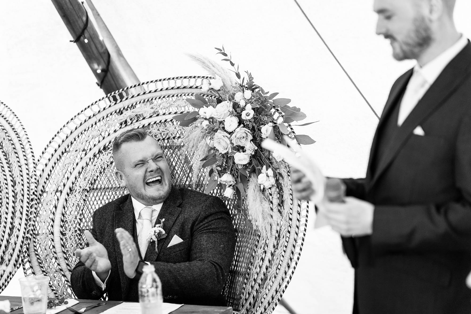 Groom applauds speech by best man