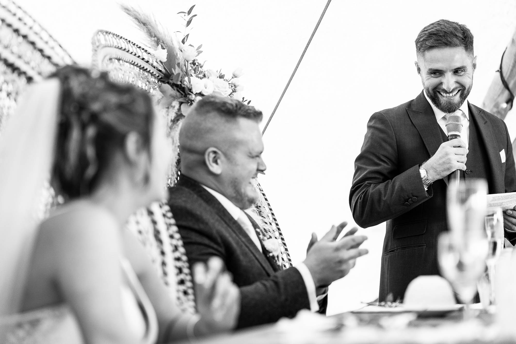 Groom laughs at best mans joke