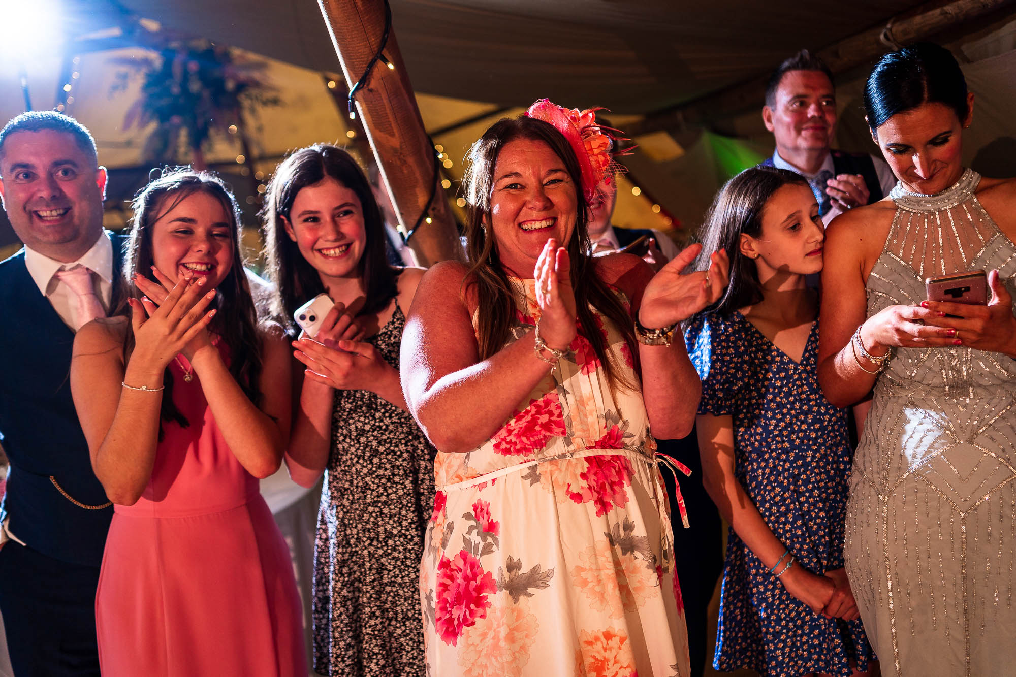 Wedding guests watch the first dance