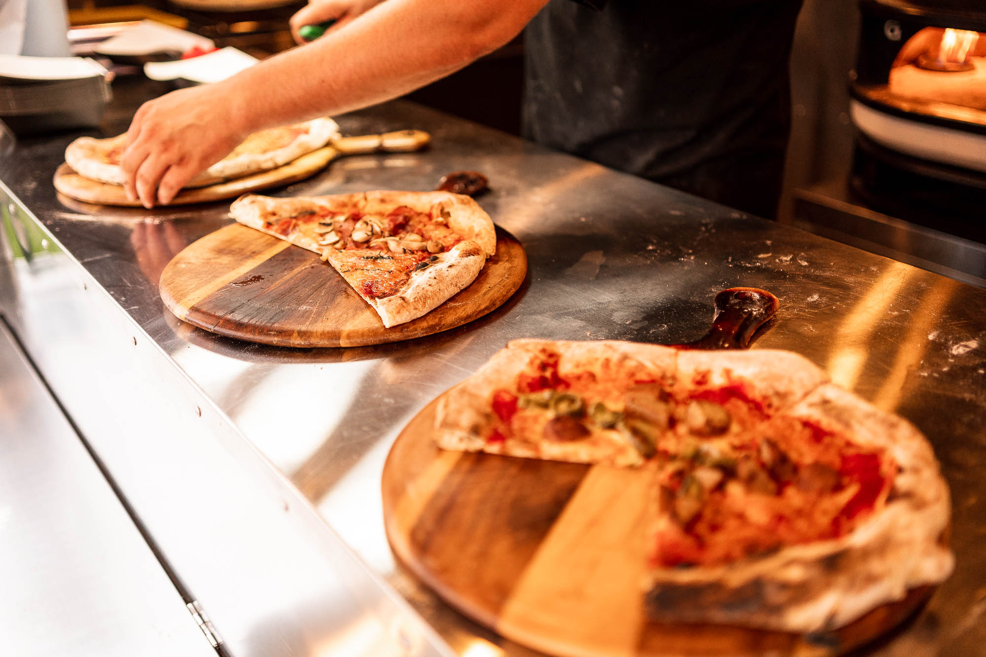 Pizzas on counter of pizza van