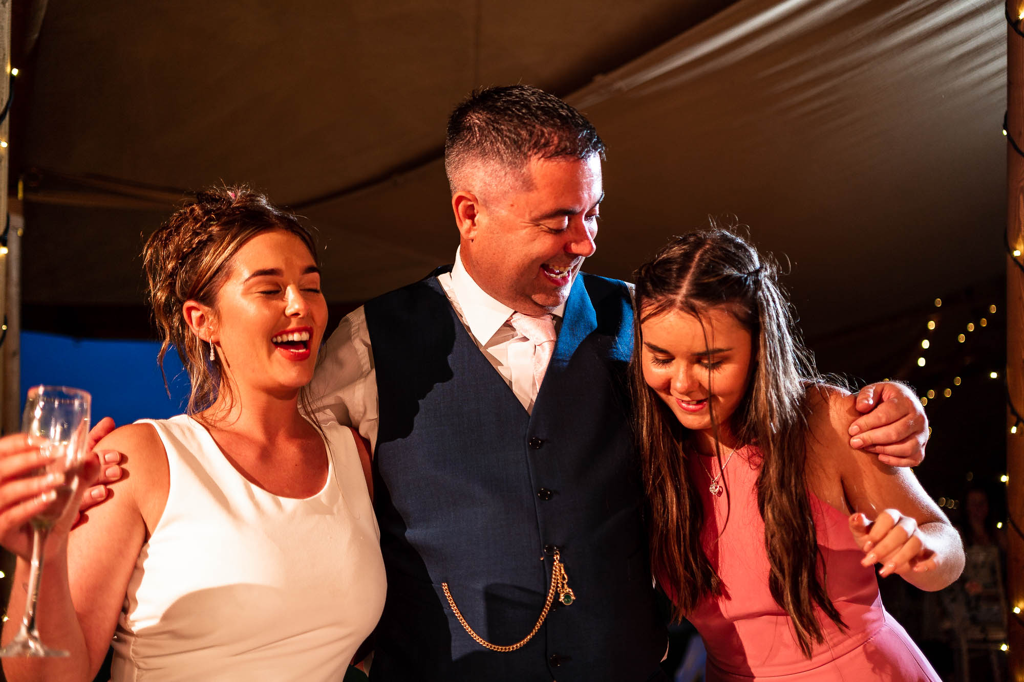 Father of the bride with his daughters