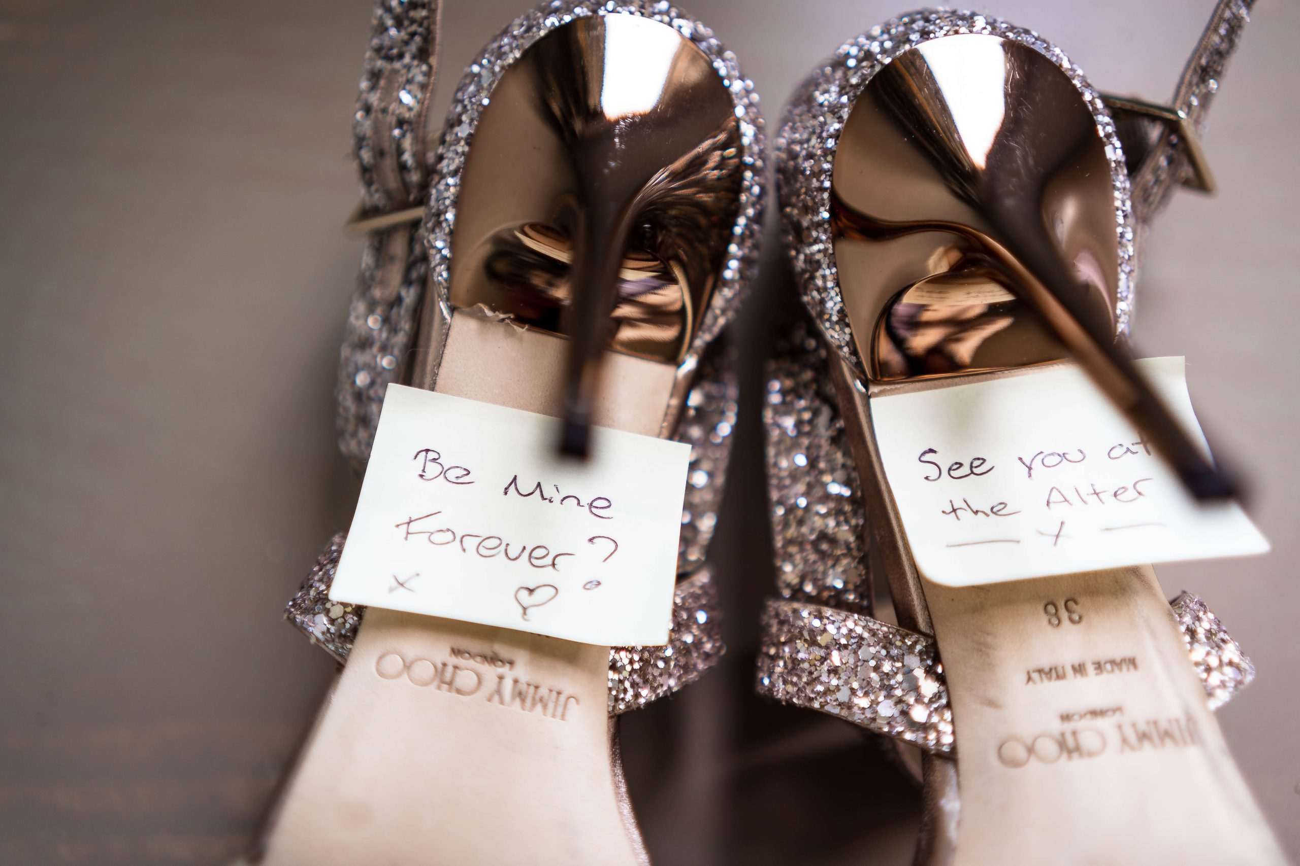 Brides shoes with stick on notes from groom 