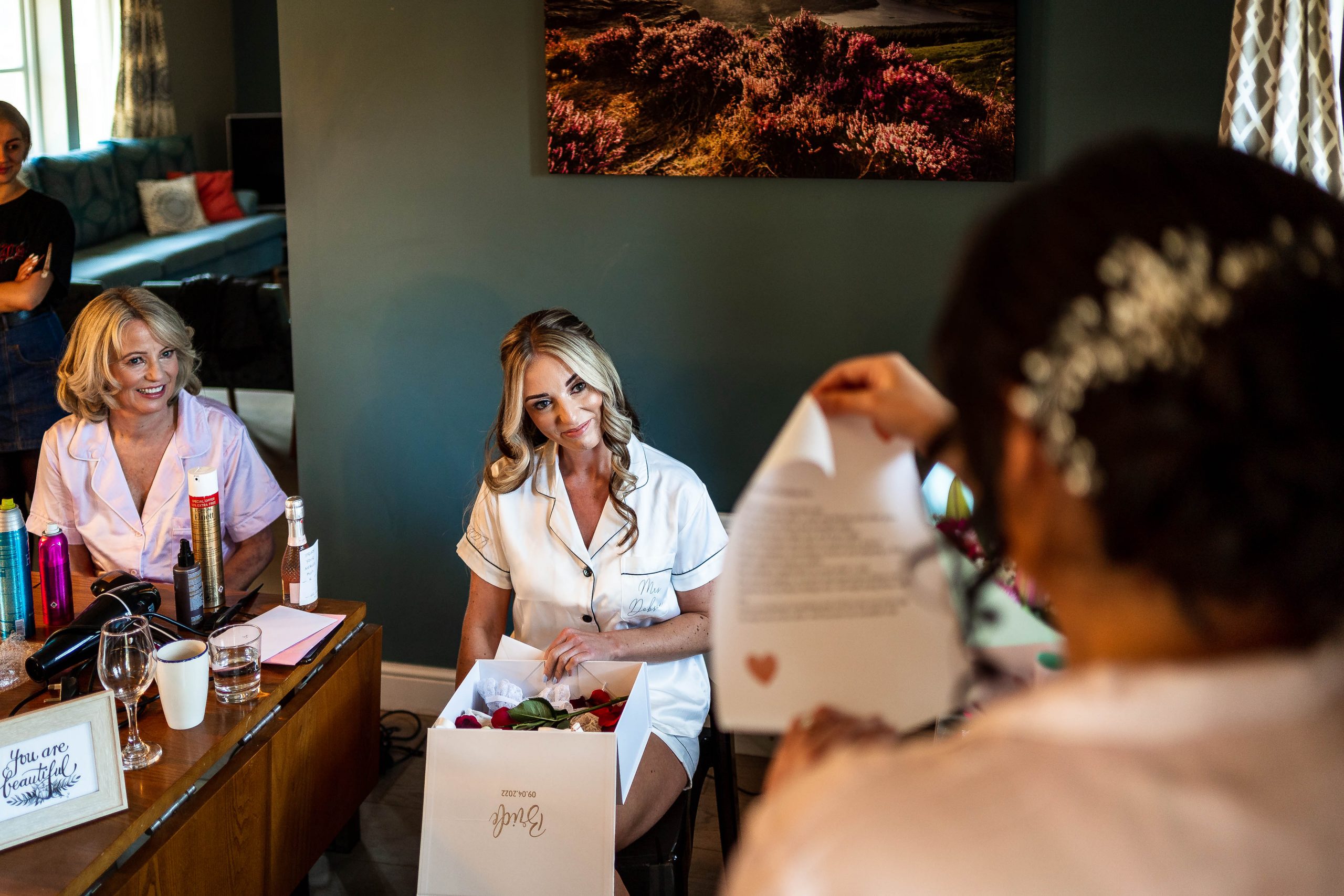 Bridesmaid reads grooms letter to the bride