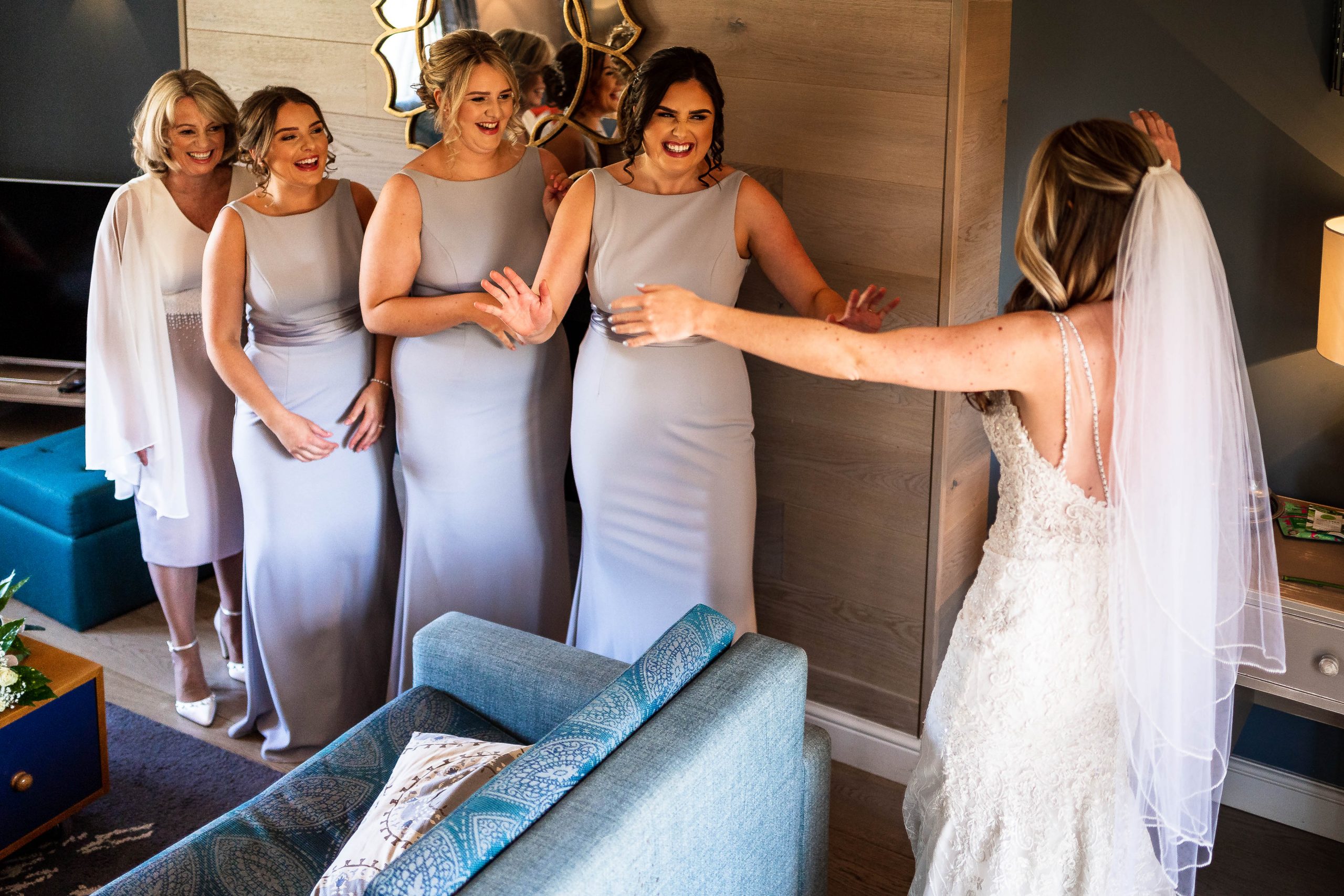 Bride hugs bridesmaid