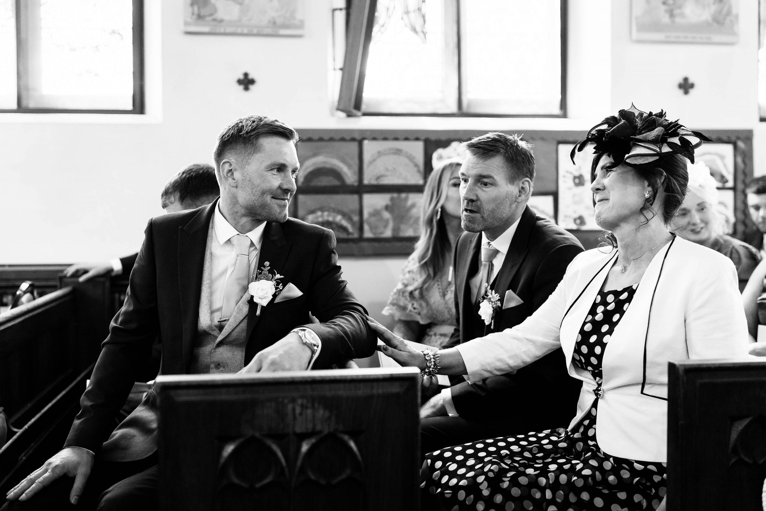 Groom smails at the mother of the groom