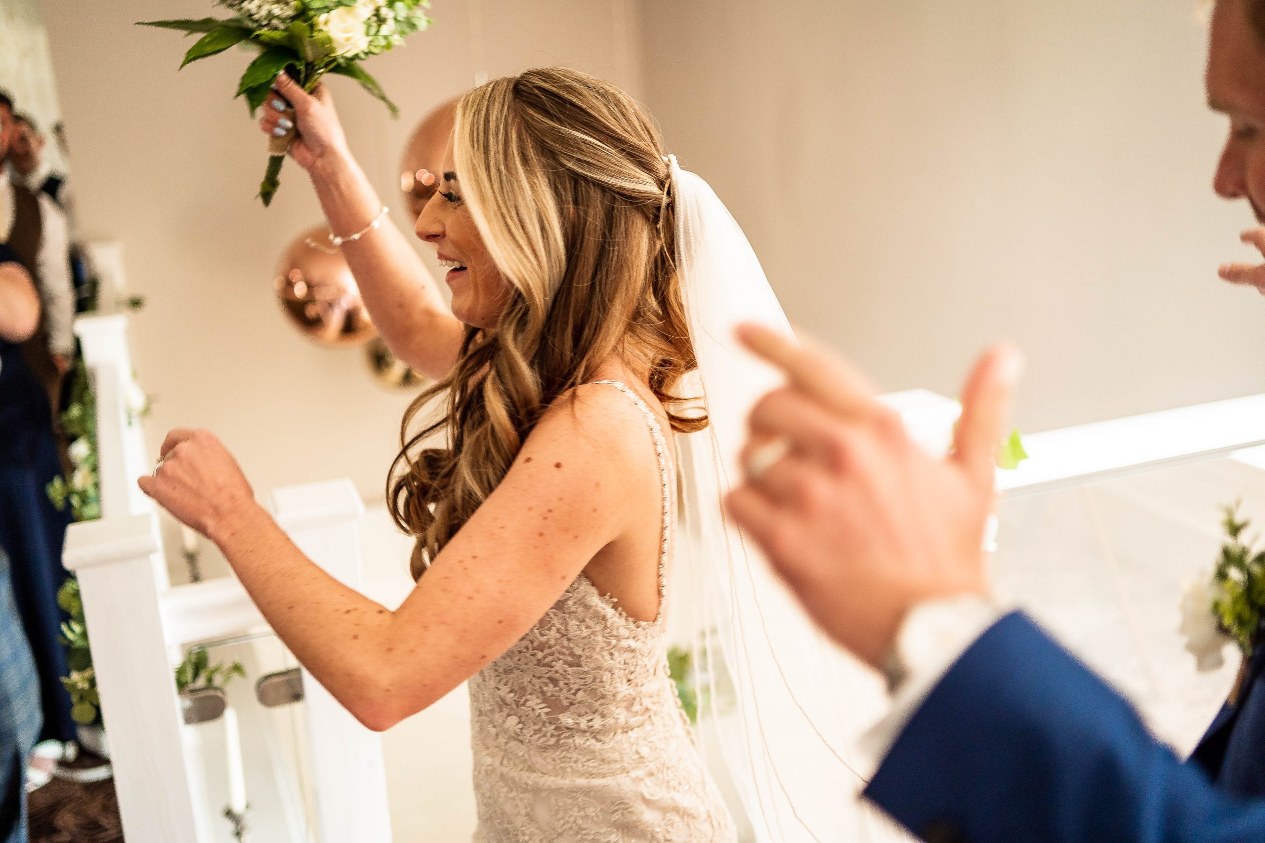 Bride and groom welcomed into weding breakfast
