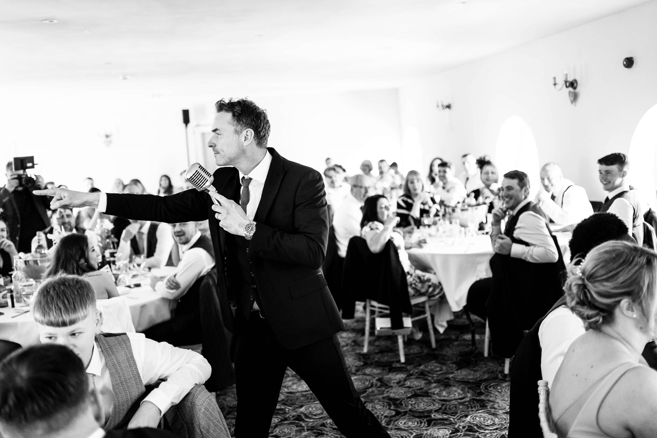 Wedding singer performs to the wedding party